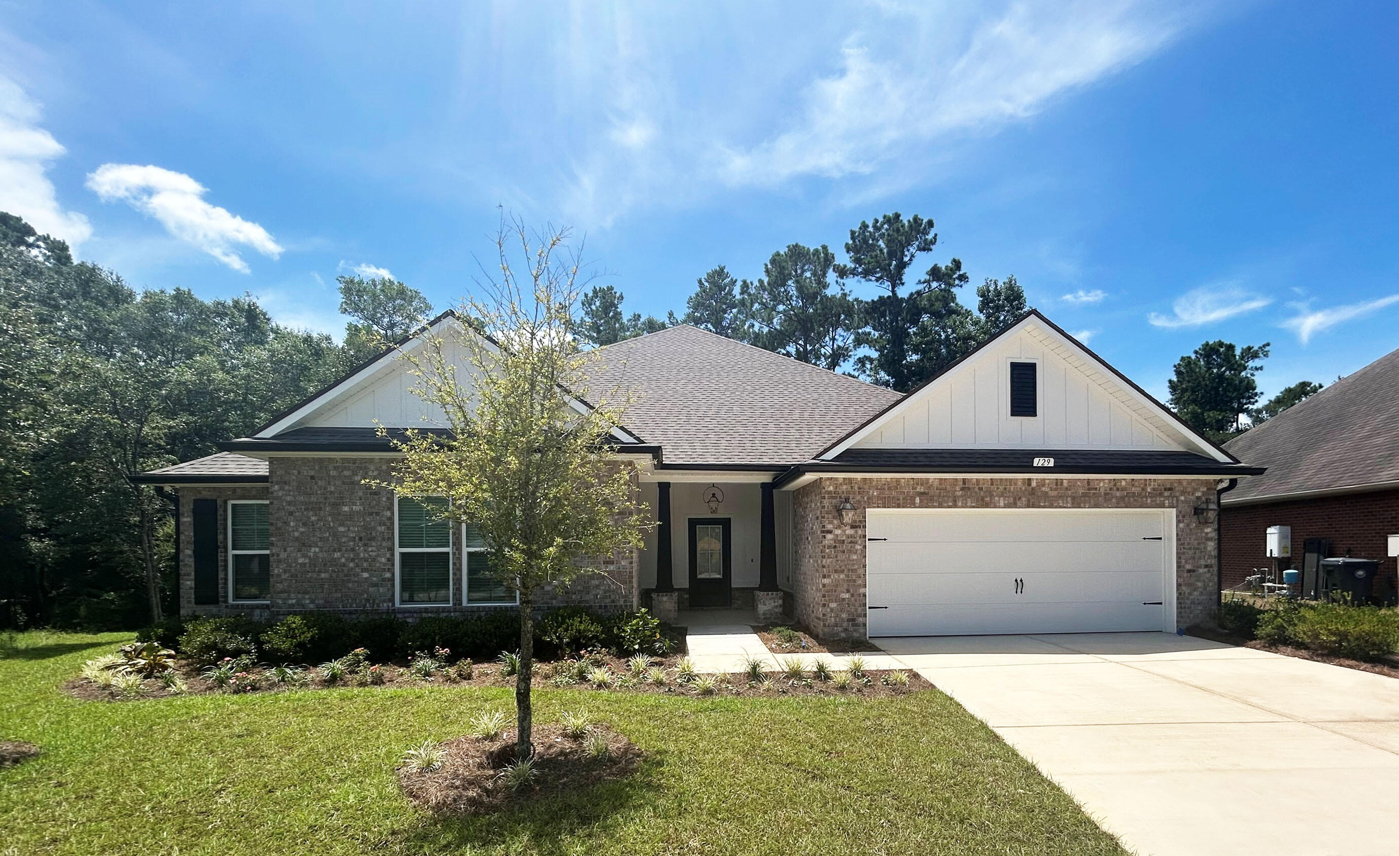 Awesome builder rate plus FREE front gutters. Restrictions apply.Located on a cul-de-sac lot, the TAFT IV G in Symphony at Hammock Bay community offers a 4BR, 2.5BA, open design with pocket office. Upgrades added (list attached). Features: separate vanities, garden tub, separate custom tiled shower, and walk-in closet in master bath, kitchen island, pantry, boot bench/drop zone in mudroom, covered porches, recessed lighting, crown molding, LED lighting, framed mirrors in baths, smart connect WIFI thermostat, smoke and carbon monoxide detectors, landscaping package, architectural 30-year shingles, flood lights, and more! Energy Efficient Features: water heater, electric kitchen appliance package, vinyl low E windows, and more! Energy Star Partner.