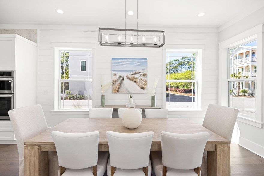 This exquisite 2024 beach cottage in Treetop Village, Inlet Beach, Florida, is a sanctuary of luxury and sophistication, meticulously designed to offer an unparalleled living experience. Featuring high-end finishes that resonate with elegant coastal charm, this home is a testament to refined living. Upon entering, you are greeted by the warm embrace of shiplap walls, engineered hardwood floors that echo the natural beauty of the coast, and raised ceilings accented with crown molding that add an air of luxury. Unique finishes include: designer furnishings and artwork, custom closets throughout the residence, quartzite and ceramic tile, stainless steel appliances, four covered balconies, including a screened outdoor porch overlooking the pool. The sleeping arrangements are thoughtfully planned offering five bedrooms with a potential sixth bunk room to maximize capacity. The first level offers a king bed with an ensuite bath and private entrance, ensuring convenience and privacy. The primary suite, located on the secluded second level, boasts an ensuite luxurious bath and private balcony for moments of reflection or intimate evenings under the stars. The third level of this magnificent home unveils three additional bedrooms, two with king beds and a bunk room with four full beds, designed to accommodate guests in utmost comfort. Balconies extending from four bedrooms offer private outdoor spaces to enjoy the fresh sea breeze and tranquil moments alone or with loved ones. The heart of the home is the open-plan kitchen, equipped with LG stainless steel appliances, quartz countertops, and a generous living and dining area, making it an entertainer's dream. Double-pane windows bathe each room in natural light, creating an inviting and warm atmosphere, while the high-tech air to heat pump ensures this home is not only luxurious but also eco-friendly. Positioned in a gated community near 30A which offers access outside your back door to the deeded beach via tram, inviting you to immerse yourself in the deeded beach access and beauty of the Gulf of Mexico. You are 10 steps to the community pool, a 170' oasis, and an outdoor shower offer a refreshing retreat within the comfort of your enclave. Featuring a gas hookup for grilling, and parking for four vehicles and a golf cart; every detail has been considered for enjoying the Florida lifestyle to the fullest.Beyond the bounds of this retreat, 30Avenue offers shopping, cafes, and amenities to complement your lifestyle. All furnishings, artwork, and housewares convey with the property, ensuring a seamless transition into your new coastal life.

Why choose 171 Redbud over other Treetop homes:
4 parking spots
Downstairs bedroom
6 total potential bedrooms
450 Square Feet of covered porches
Engineered waterproof flooring
Corner location, proximity to pool and tram stop

This beach cottage is not just a home; it's a lifestyle choice that promises serene living, luxurious comforts, and unforgettable moments on 30A