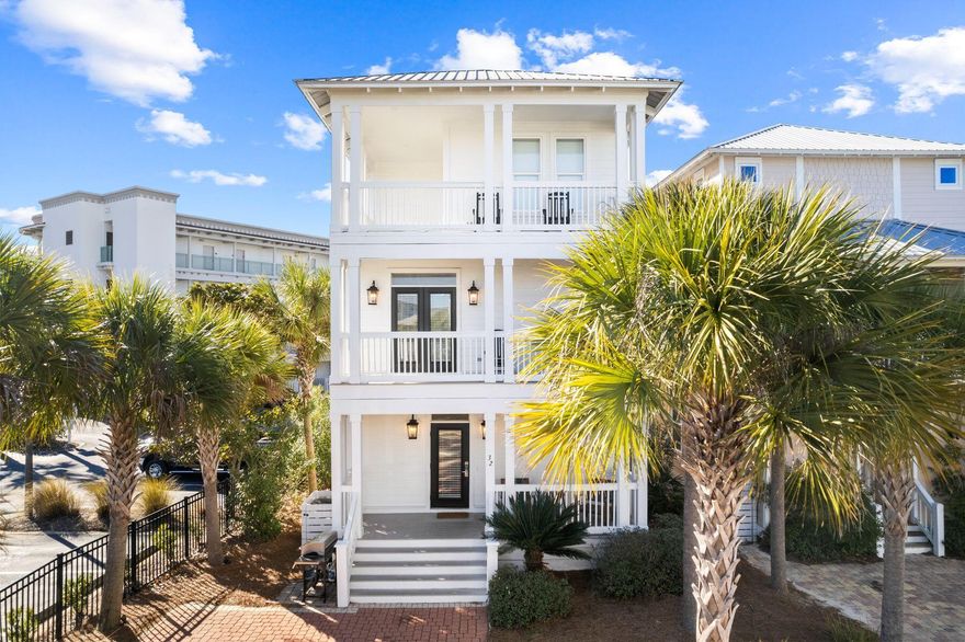 Completely renovated by the current owners, this home has been transformed with new furnishings, appliances, countertops, light fixtures, interior and exterior paint, and built-in bunks. Refreshed, you could be forgiven for thinking it's a brand new home. Park on the driveway and step onto the front porch where you'll make memories socializing and relaxing. The light-filled living and dining areas will be a natural gathering place for making plans and exchanging updates of your exciting adventures. At the hub of the home, the chef-worthy kitchen has new Viking appliances, countertops and backsplash as well as a pantry and new washer and dryer in the laundry. Head up the stairs to the second floor where two magnificent king suites each have their own private ensuite bathrooms, balconies and TVs. One master also includes an in-room wet bar allowing you to brew your own morning coffee or pour a glass of chilled wine from the mini-fridge and enjoy it in this private haven. The spacious second master boasts custom draperies, gorgeous decor, a generous bathroom and balcony. The third floor is the kid's zone with a queen-sized bedroom, full bathroom and a bunk room that will comfortably sleep up to eight excited youngsters. There's space for them to enjoy sleepovers, play games or watch a favorite movie. Professionally designed and equipped as a luxury vacation home to sleep 14, the location of this beach house makes it ideal for rental investment. Walk to the 12,000 sqft. lagoon pool and deeded beach access or make use of the beach tram service. The home is enviably located close to Seacrest and Alys and Rosemary Beaches, and is a short walk from all the action on Highway 30A. In short, it's where everyone wants to be.