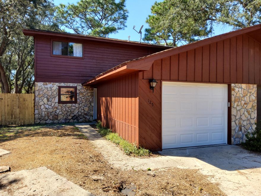 Renovated Three Bedroom, 2.5 bath townhome on a corner lot in heart of Shalimar convenient to Eglin Air Force Base and Hurlburt Field.  Home features a large privacy fenced side yard, patio, and 2 parking spaces in addition to the driveway and garage. Kitchen features granite counters, pantry, breakfast bar, Stainless appliances, and tile flooring throughout 1st floor. Laundry room/half bath on 1st  floor.  Coat closet and under-stairs provide extra storage. Upstairs find 3 bedrooms with new ceiling fans and 2 full baths with beautiful custom tile work.  Master bath features a walk in shower.  Luxury vinyl planking installed throughout 2nd floor.  A baclony off one of the back bedrooms provides a peaceful retreat.