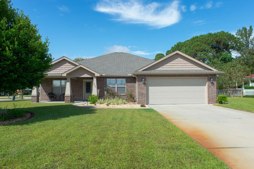 This beautiful 3 bedroom, 2 bathroom home with 2 car garage is located minutes from the bases and beaches, an elementary, middle, and high school are all located within 5 miles from the home. This split floor plan sits on a large corner lot, with an open floor plan, has granite countertops in the kitchen and both bathrooms, stainless steel appliances, the master bedroom, dining room, and foyer all feature trey ceilings with crown moulding. 20 porcelain tile is featured throughout the home, with carpeting in the bedrooms. Recessed lighting is featured in the living room and master bath. The master bathroom includes a separate shower and tub, double vanities, separate toilet room, and large walk in closet. This home has a privacy fence with an automatic sprinkler system with rain sensor.