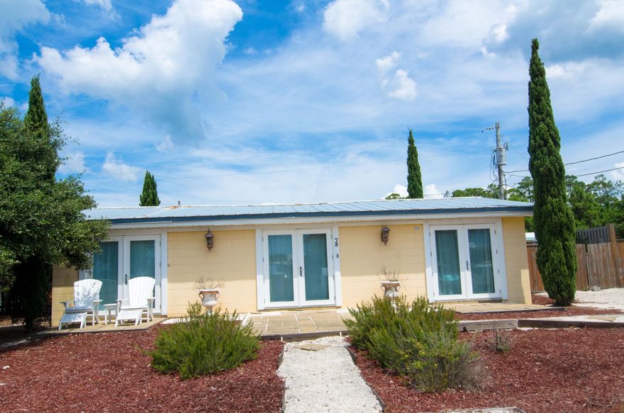 This charming home is just 2 streets away from the beach. Enjoy the fabulous 30A lifestyle for a great price. Partial water view. Lots of natural light through sliding glass doors. Large ensuite master bathroom with large tub and walk in shower. Double sinks with granite in both bathrooms. Full size washer and dryer. The back yard is fenced in with a privacy fence. Large patio area for outdoor entertaining. Concrete block construction. Plenty of fun Restaurants and Bars nearby. Close to Oyster Lake. This is a rare offering in a much sought after area. Buyer to confirm all information.