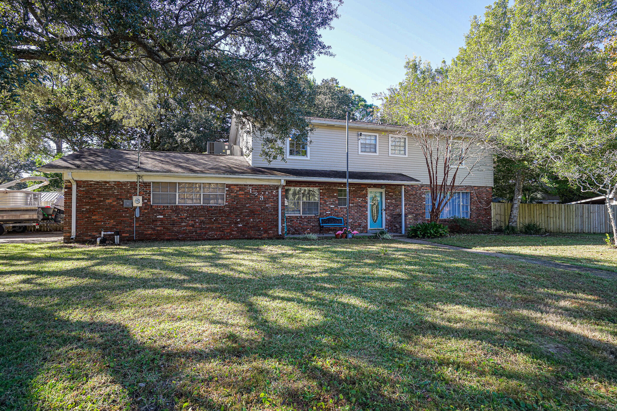 Welcome to this spacious family home on a corner lot in the family friendly Colony Estates neighborhood. Upstairs has original hard wood floors. There are 2 very spacious living areas and a generous sized kitchen and dining room.Kitchen has granite countertops and a breakfast bar. Kitchen sink overlooks back yard. Living room has a fire place and beautiful engineered wood floors. Entry door to first floor bedroom and kitchen are English glass panel doors. No carpet. Ready for your family. Buyer to verify all dimensions and listing descriptions for accuracy.