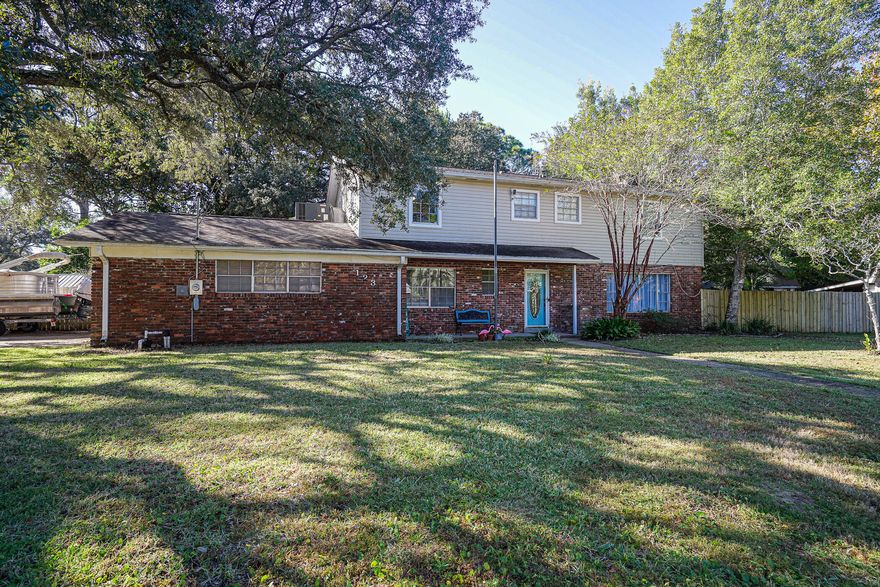 Welcome to this spacious family home on a corner lot in the family friendly Colony Estates neighborhood.  Upstairs has original hard wood floors. There are 2 very spacious living areas and a generous sized kitchen and dining room.Kitchen has granite countertops and a breakfast bar. Kitchen sink overlooks back yard. Living room has a fire place and beautiful engineered wood floors. Entry door to first floor bedroom and kitchen are English glass panel doors. No carpet. Ready for your family. Buyer to verify all dimensions and listing descriptions for accuracy.