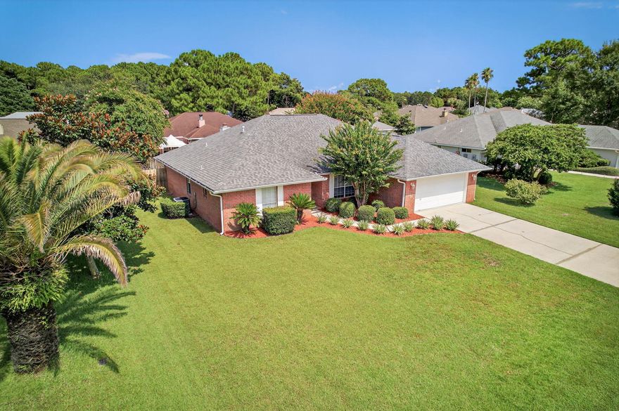 Presented with staging furniture - 4BR/3BA home with major updates: ROOF (2020), HVAC (2021 & 2022), and Water Heater (2022). Spacious layout in a quiet Miramar Beach neighborhood less than 5 minutes to Geronimo St. public beach access and just a mile to scenic beach walks. Conveniently located by Silver Sands Premium Outlets, dining, Grand Blvd/Sacred Heart, and Destin Commons. The neighborhood offers easy access thanks to a traffic light at the entranceno U-turns or median crossings required! Community amenities include a pool, tennis court, picnic pavilion, and overflow parking just a few doors down across the street. The HOA is currently enhancing shared spaces with a new playground and public dock featuring bayfront seating. On the inside, the open concept living area features soaring cathedral ceilings and large windows that fill the space with natural light. A thoughtfully designed split-bedroom floorplan provides privacy and comfort for both owners and guests. The kitchen is equipped with a classic white enamel sink, a cozy breakfast nook, and convenient breakfast bar seating. A formal dining room easily accommodates a 10-12 person table, perfect for hosting holidays and special gatherings. The expansive primary suite includes enough room for a sitting area while the en-suite bath boasts a walk-in closet, separate linen storage and double vanity. Secondary bedrooms are well-sized with ample closet space and share a connected Jack and Jill bathroom. Ceiling fans are installed throughout the home, and storage is abundant with walk-in and step-in closets in every bedroom. Don't miss this rare opportunity and schedule your private showing today! 