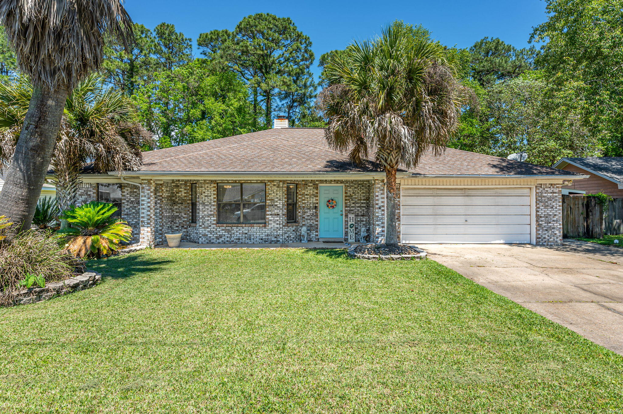 Welcome home! This 3 bedroom, 2 bathroom home with 2 living spaces is sure to impress. Greeted by tile throughout the home, this carpet-free home is the ultimate in low maintenance living. A wide open living space is perfect for entertaining. With a chef's kitchen with amenities galore, enjoy gathering at the large center island. A fireplace is the focal point of the main living area. The split bedroom floor plan puts the other two bedrooms on the other side of the home for privacy. Stepping outside, the fully-fenced backyard and open patio is perfect for backyard get-togethers. Plenty of room for a pool to be put in, if that's what is desired. The HVAC was replaced in 2021, and the roof will be replaced with an acceptable offer. Schedule your appointment today!