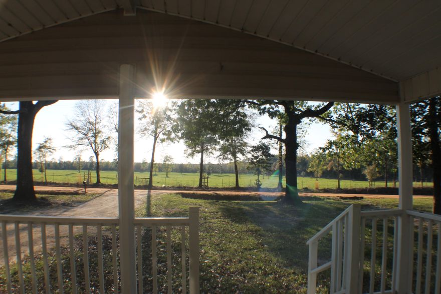 Relax in quiet on the front porch and watch the sun set over the cow pasture! Magnificent Hardwoods, new paint, Metal roof with room for a barn! Fronts on Two dirt roads. Split it or put in a back entrance.