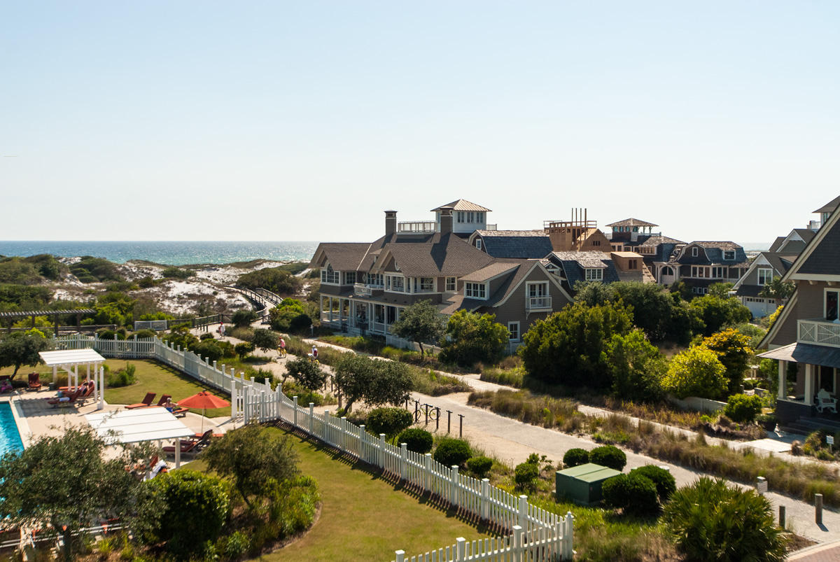 A Legacy Show House of architectural significance on the Gulf in WaterSound Beach, this 4,280 square-foot residence with carriage house, designed by New York-based architect John Kirk with Cooper Robertson Architects was the first home built in WaterSound Beach and the 2004 Southern Accents Dream Home. With a legacy as the community's original Show House, which precisely defines the development's vision of a Shingle Style architecture, the residence was recently fully remodeled with interior and exteriors installed by renowned interior designer Erika Powell of Urban Grace, The residence and carriage home feature 4 bedrooms, 5 full bathrooms and 1 half bath, with additional bunk sleeping areas. Deep porches wrap this legacy home, with ideal accesses to the pedestrian boardwalks, and