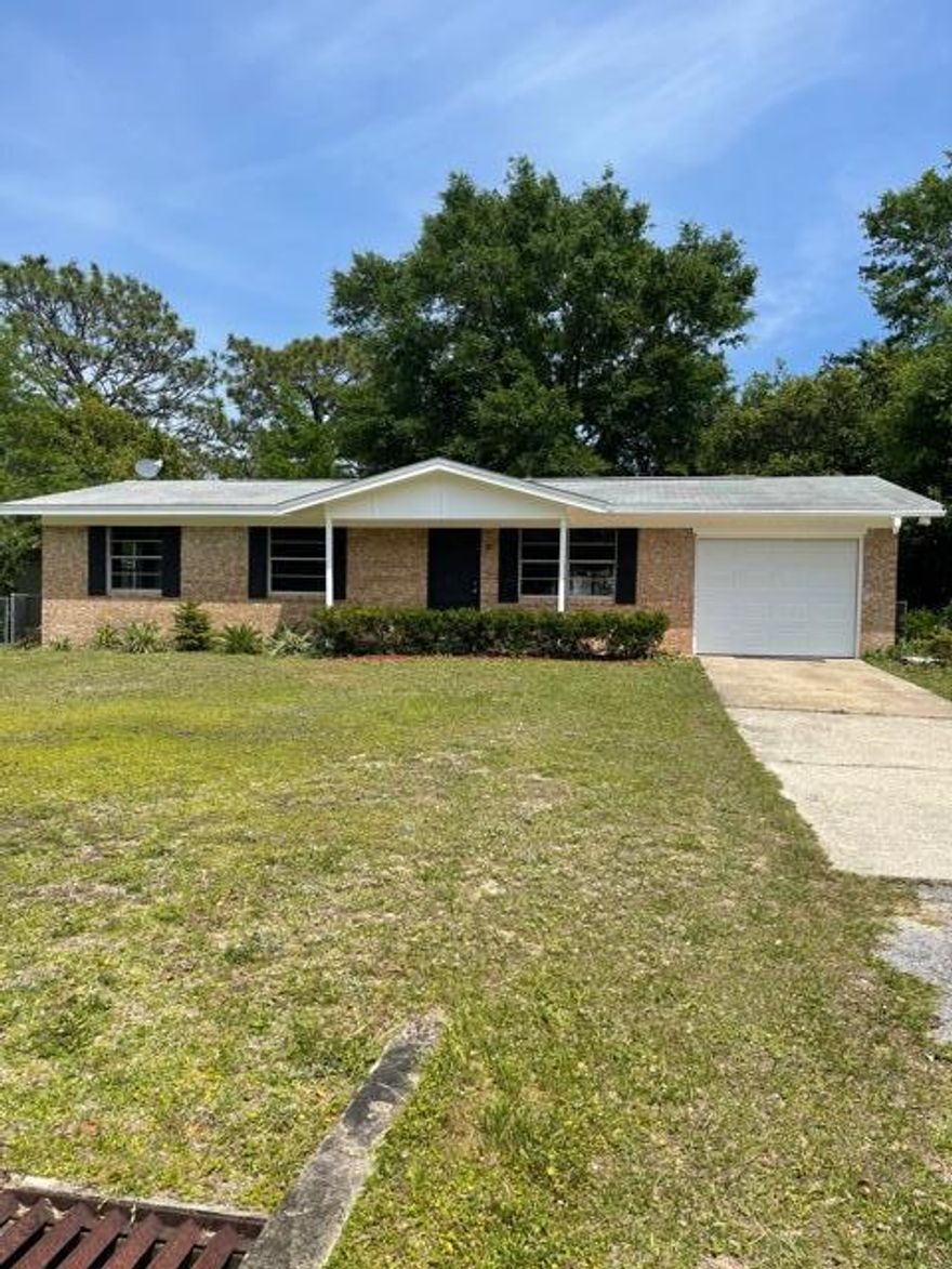 Three bedroom two bath brick  and cinder block built home awaits you  With over 1100 sq. ft of living space and a back covered porch for your privacy. Enjoy this tastefully renovated home with tons of space! New 3 dimensional roof! New Copper Wiring throughout!  New Luxury Vinyl Plank flooring throughout ,Newly painted inside and out, New light fixtures!!!! Open living room & kitchen . Home to be sold AS IS