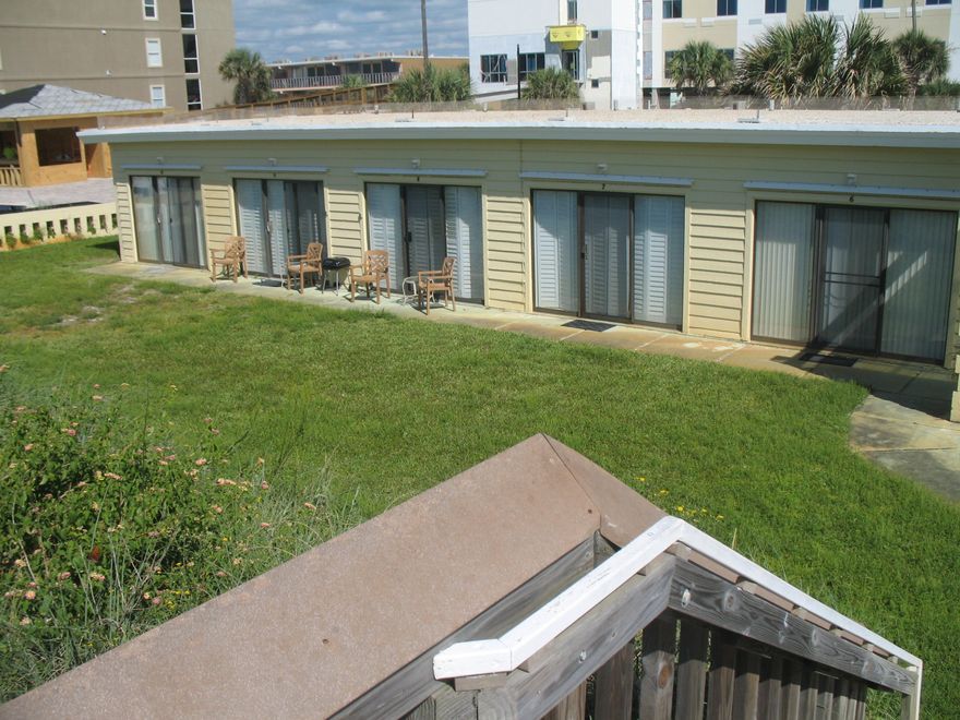 The perfect hideaway. Tucked behind the sugar white, sea oat filled sand dunes of the Emerald Coast, this bungalow is the perfect getaway!!! Beautiful natural solid wood walls, murphy bed, bathroom, and kitchen are all you need to enjoy a true vacation hideout. A unique opportunity to purchase into this 10 unit cooperative. Each owner is issued a share of stock in the corporation. A true one of a kind find!!!