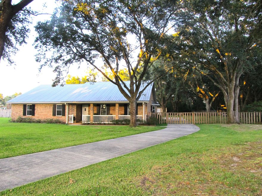 Impressive 4 BR/3 BA home situated on quiet cul-de-sac with oak canopy back yard & rear entry 3 car garage. You'll adore this spacious, well thought out kitchen with loads of custom cabinets that pull out for easy accessibility and professionally designed countertops. Open concept also features huge 16x16 dining space with 8x12 area for home biz, school, etc.  Laundry room boasts custom cabinets as well for additional storage.  Bedrooms feature custom built furniture with master suite having double vanity and large walk-in closet.  Home has spray foam insulation and gutters with covers for easy maintenance.  Garage features a Jet Air Filtration System if you desire to use the extra space for workshop. Every part of property has been exceptionally maintained. See Documents for remodel info