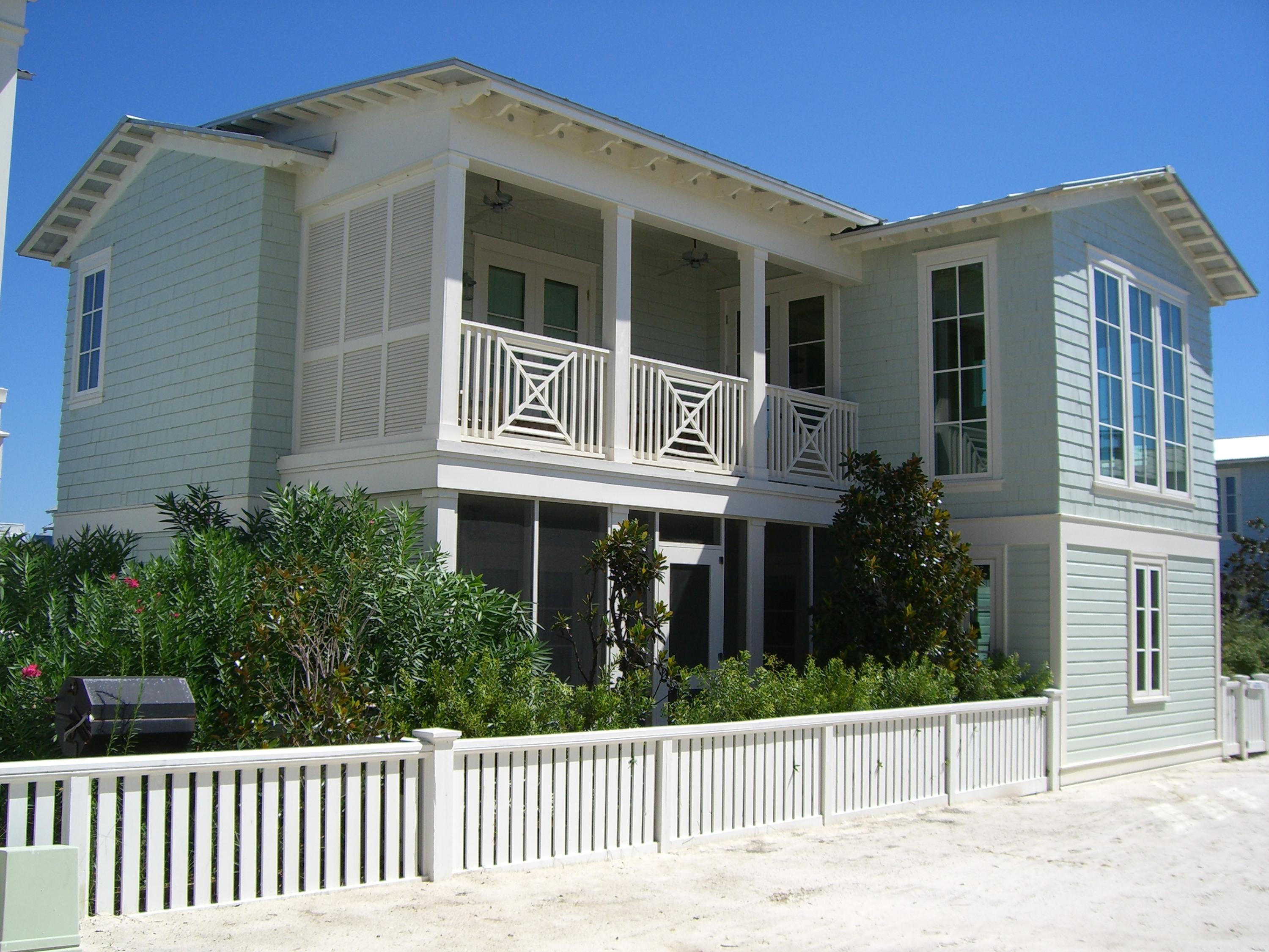 3 bedrooms, 2 bunkrooms, 3 bathsIt's all about location and this one's got it! South of 30-A and adjacent to the Pensacola beach pavilion, this extremely well cared for home offers the most astounding gulf views without the astounding gulf front price! With three master suites, each with en-suite baths, everyone is treated like a King. Two bedrooms have attached bunk rooms with built-in bunks. Beautiful Australian-cypress hardwood floors gleam throughout the cottage. Mostly wood interior offers low maintenance and that comfortable 'beachy' feel everyone loves. The custom gourmet kitchen boasts beautiful granite counter tops, Sub-Zero paneled refrigerator, Bosch dishwasher, Dacor gas oven/range, GE built-in microwave, and dining bar.