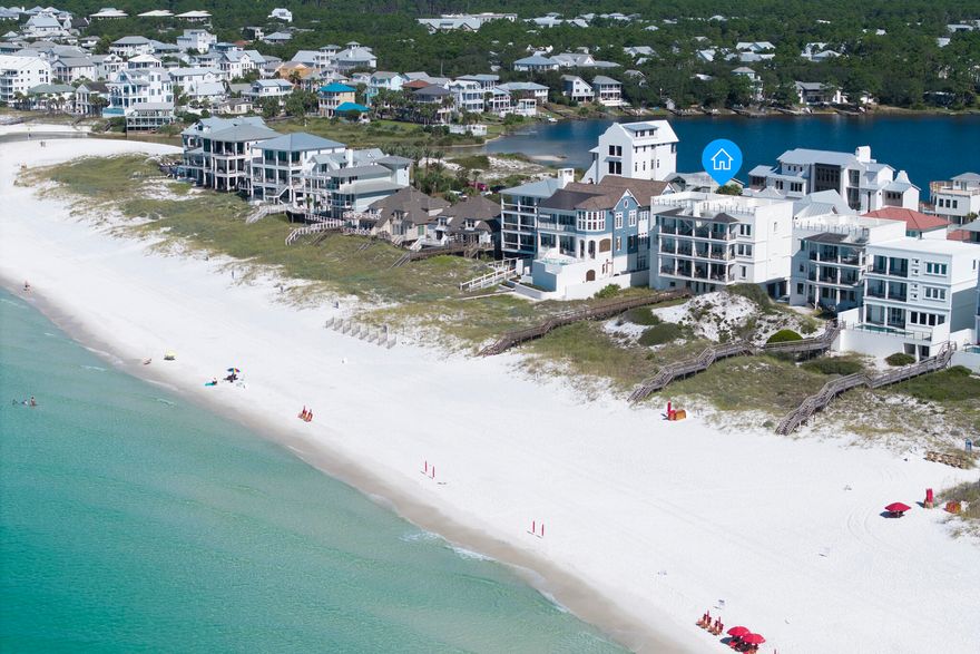 Welcome to Azzurro, a name that translates to ''blue'' in Italian, perfectly capturing the crystal blue waters of the Emerald Coast just beyond your doorstep. This extraordinary 4-bedroom, 4,272 sq. ft. Gulf-front residence redefines coastal luxury with 109 feet of pristine beach frontage, a private dune walkover, and a rooftop pool offering panoramic views. Set on nearly an acre, this rare offering combines architectural brilliance, premier finishes, and first-class amenities in one of 30A's most coveted locations. Masterfully designed by Eric Craig of B. Design, every detail reflects thoughtful craftsmanship and refined elegance. Soaring 9-10' ceilings, porcelain wood-look tile, spruce ceilings, custom mosaics, and designer lighting create a seamless flow throughout. Impact-rated glass, ICF construction, superior insulation, multiple SEER 18 HVAC units with dehumidifiers, tankless gas water heating, and smart-home technology ensure both security and efficiency. The crisp white fa??ade, paver drive, and 3-car garage with additional parking complete the home's striking curb appeal.

The first level is designed for entertainment, offering a spacious game room with wet bar and full bath, ideal for easy access after a day on the beach. A private elevator services all four floors, leading to multiple Gulf-front living areas and balconies that invite endless views and natural light. At the top, the spectacular rooftop retreat features a stainless steel pool with mosaic-tiled steps, a paver sun deck, and a tempered-glass surround that maximizes breathtaking panoramas.

The heart of the home is found on the second floor, where the kitchen, dining, and great room blend seamlessly in an open-concept layout framed by floor-to-ceiling glass. A coffered ceiling, LED fireplace, and custom furnishings by Lisa Hunter Interiors elevate the space. The chef's kitchen is a showcase of form and function, boasting Sub-Zero refrigeration, a Wolf 8-burner dual-fuel range with griddle, wine cooler, soft-close cabinetry, and a designer backsplash.

The third floor hosts two Gulf-front bedroom suites with direct balcony access, complemented by a fantastic flex space with wet bar. Each suite features a spa-inspired bath with custom tile, Quartz vanities, and walk-in showers. 

The top floor is reserved for the primary suite, an oasis of sophistication with a freestanding soaking tub, walk-in shower, dual vanity, expansive walk-in closet, and sweeping Gulf views. An additional Gulf-front guest suite with private bath and a full pool bath complete this level, ensuring both luxury and privacy for family and guests.

Sold fully furnished and professionally decorated, Azzurro is truly turnkey. With rental revenue of $225K YTD, it presents both an exceptional investment opportunity and a world-class personal retreat. Smart-home systems allow owners to manage climate, security, pool, and garage features with ease from anywhere in the world. Nestled on a private palm-lined paver street shared by only three Gulf-front homes and this exclusive condominium, the residence balances privacy with convenience.

Ideally located in Seagrove, just minutes from Seaside, Alys, and Rosemary Beach, residents enjoy instant access to fine dining, boutique shopping, rare coastal dune lakes, and scenic state parks. Local favorites like Old Florida Fish House, Buddy's Seafood Market, and Beachy Bean Coffee are just a short bike ride away. Blending timeless elegance with modern innovation, Azzurro is more than a home, it is a Gulf-front sanctuary designed for those who expect the very best.
