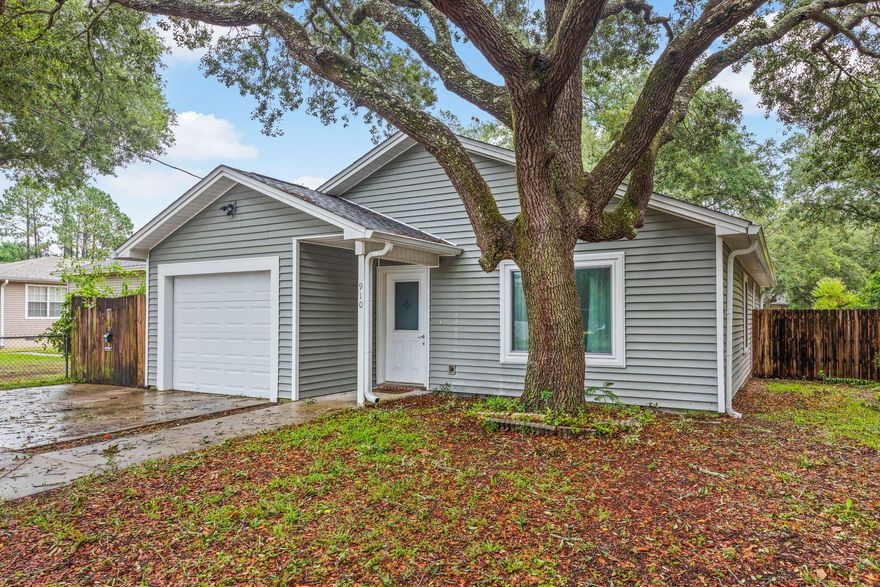 Nice home conveniently located on a large lot in the heart of Niceville. Features include wood laminate flooring in main living areas and master bedroom, tile in kitchen and bathrooms. The eat in kitchen has a newer stainless steel refrigerator and sink with garbage disposal, white cabinets and lots of light. A sliding glass door leads from the dining area to the open patio and large fully fenced backyard. The master bedroom has a walk-in closet and en suite bathroom with newer vanity and picture frame mirror. Two additional bedrooms share a bath. Roof is 2022. Come take a look today!