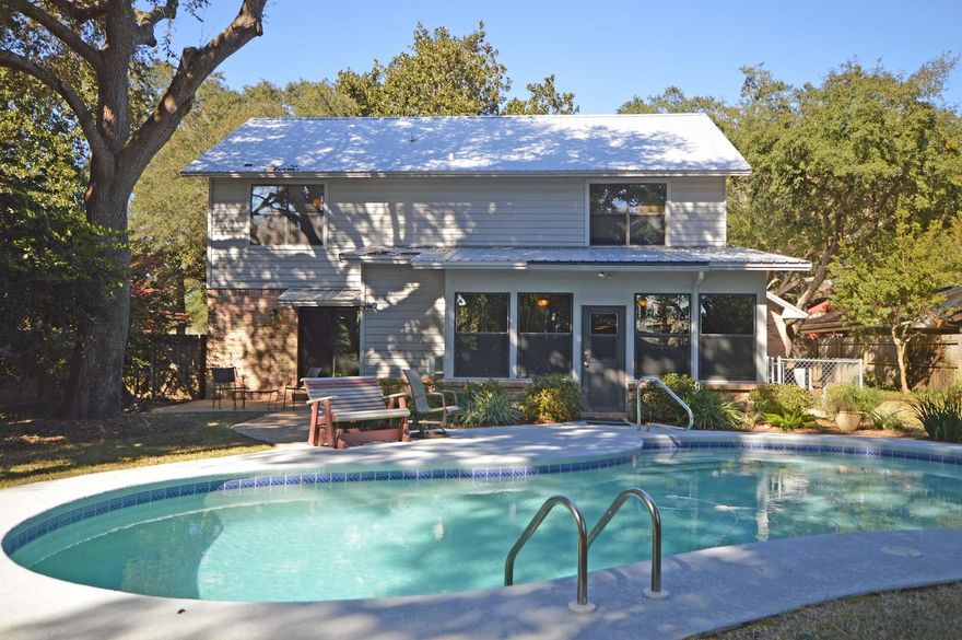 Beautiful and Amazing 2 Story POOL home in Shalimar! 4 Bedroom, 3 Bath Home has a Glass Enclosed Florida Room that overlooks the Kidney shaped Saltwater Pool for relaxing and entertaining. This home has had a complete remodel in 2009. New Metal Roof 2015! Kitchen has beautiful granite countertops with Large Island area complete with modern cabinets, pull out drawers, area for bar stools AND a built in Wine Refrigerator! Home has Decora cabinetry featuring Maquis square edge door style in Cherry with an Arlington stained and sealed finish. The large GAS stove will make entertaining a dream. Additional cabinets on each side of the gas stove provide easy access to cooking supplies. Bathrooms updated with granite, fixtures, Master Bath updated with new walk in shower, cultured marble shower