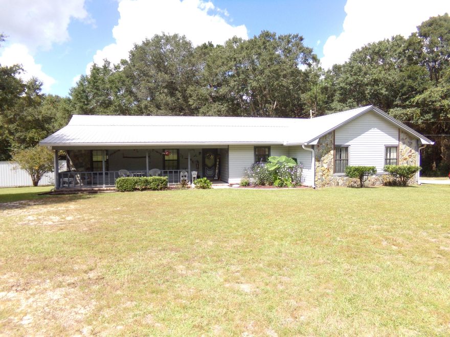 2009 sq. ft., 4 Bedroom, 2 baths, pole barn, shed and on 2 acres just off the north end of Old Bethel Road~  Split floor plan, formal dining with large front porch to enjoy the  morning coffee or evenings, also large back deck~ The kitchen has lots of cabinets and counter space with a built in breakfast bar~ Wet areas are tiled and living room and bedrooms carpeted~   There is plenty of room outdoors and just off the beaten path~   Large pole barn, 5 stalls & a storage room~ Property being sold ''AS IS''~