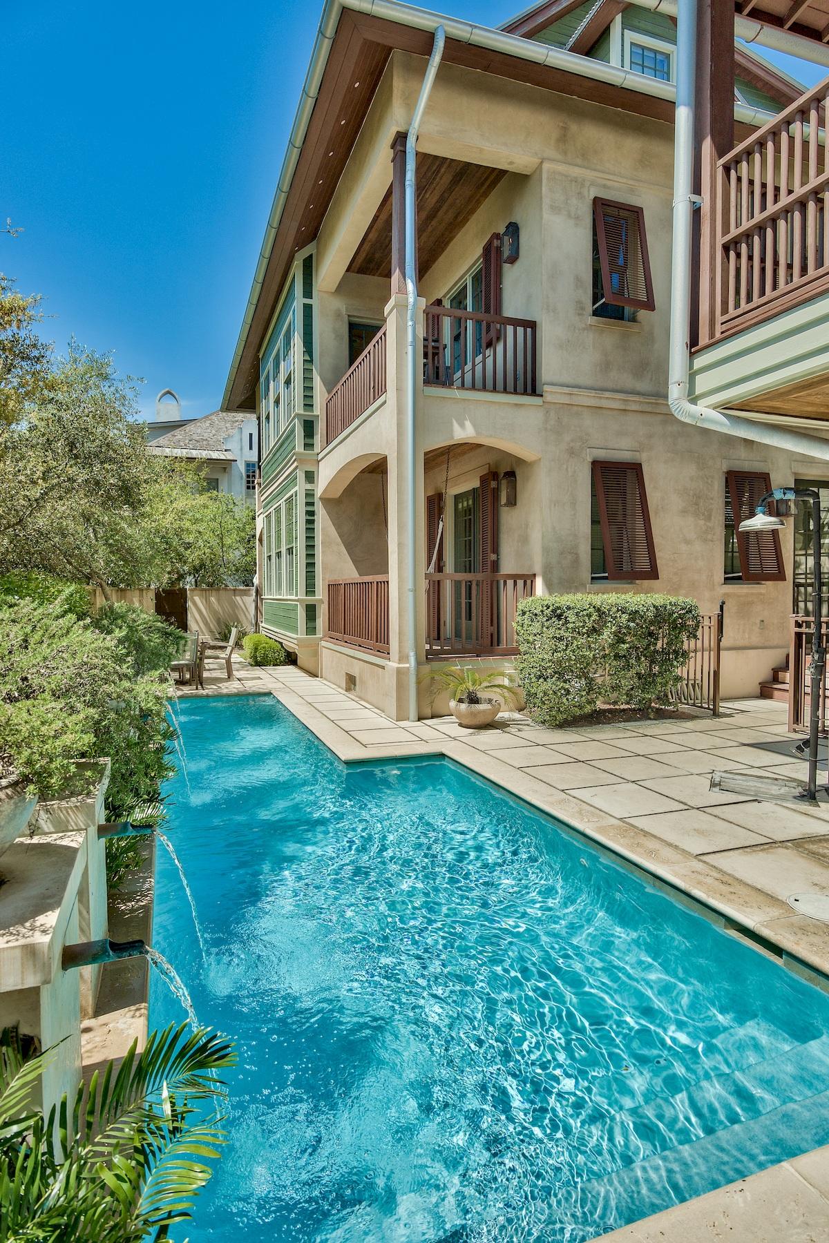 This furnished Rosemary Beach home and carriage house sits on a corner lot on the south side of Scenic 30A including an elevator, private courtyard, and pool. This home fronts a small park and is next to a boardwalk to the beach with only 2 homes between you and the beach! Strong Rental History with 2019 Rental Projection of $285,728. Recently repainted inside and out, as well as a kitchen renovation, this beach home with proven rental is ready to enjoy! Entering the first floor, you'll find the master bedroom, with separate sitting area complete with wet bar and private porch. A guest bedroom including an en suite bathroom is also on the first floor. On the second level you will find an open kitchen, dining and living area with great balconies overlooking the pool and lush landscaping.