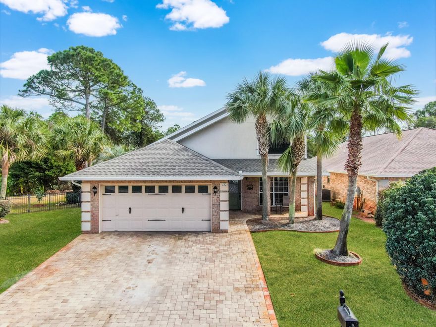 Located in the gated community of Emerald Lakes in Destin, FL, 322 Wimico Circle is a beautifully maintained property that seamlessly blends charm with modern updates. This 1,836 square foot brick home has undergone thoughtful upgrades, ensuring it meets the standards of contemporary living. The home's exterior is immediately inviting, with newly laid brick pavers on the driveway and sidewalk, enhancing the home's curb appeal. The addition of new gutters and screens not only add to the aesthetics, but also offers practical benefits. Inside, the home exudes warmth and modern elegance. The updated lighting and fixtures throughout create a bright and welcoming atmosphere. The kitchen stands out with its updated cabinets featuring soft-close mechanisms and new hardware, and