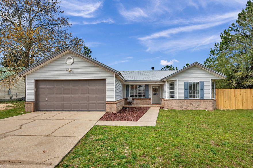 Beautiful 3 bedroom 2 bath home situated on a large, corner lot just south of I-10! Wonderful open floor plan with spacious living room boasting vaulted ceilings and a cozy corner fireplace, bonus room that makes a great office and a heated and cooled Florida room overlooking the back yard. Wonderful split bedroom floor plan with the Master on one side and additional bedrooms on the other with a shared bath in between. Beautiful laminate flooring throughout main living areas and carpet in the bedrooms. Gorgeous kitchen with stainless steel appliances, granite countertops, breakfast bar, plenty of cabinets and a pantry. Dining room with built-ins is right off the kitchen and living room which is so great for entertaining!  You will just love all of the natual light in this home!!! Solar