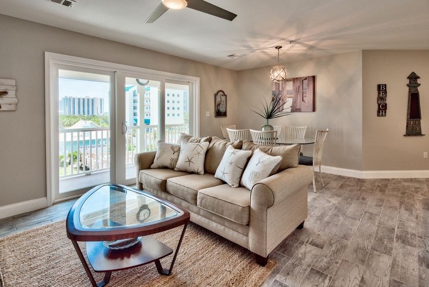 DEEDED BEACH ACCESS in the HEART of DESTIN across from Big Kahuna's waterpark. Life is wonderful in this unique villa subdivision with only 40 units -- no towers and definitely no crowded elevators! St Martin Beachwalk Villas offers the perfect environment for a relaxing vacation. The lush & tropical grounds are well kept. The property features a club house and heated pool with large decks and grill patios. A complex the whole family will love with only a short walk to St Martin's own gated beach access. Super vacation rental potential, or just keep this completely RENOVATED/updated condo as your personal,second home or even guest house. Upgrades include, but not limited to, newly installed JELD-WEN Premium Atlantic Vinyl impact windows and sliding glass doors; quartz kitchen counter tops; tile flooring throughout the condo; upgrade stainless steel appliances, new bathroom vanities/counter tops and toilets.