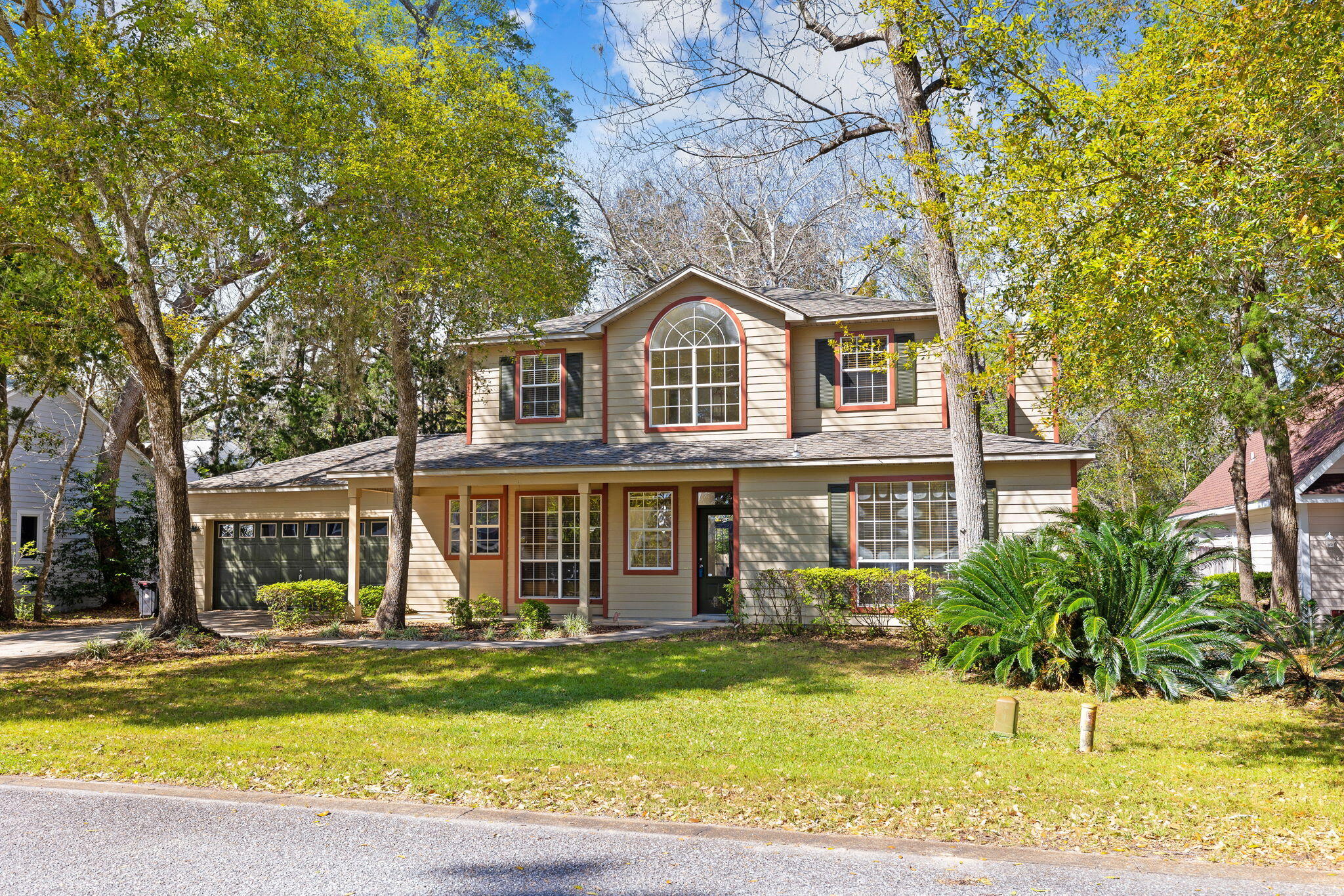 Welcome to the quiet and charming neighborhood of Moore's Landing! This spacious 5 bedroom, 2.5 bath home offers ample space for your family and guests. The property is ideally located just 5 minutes away from a wide range or restaurants, shops, and the hospital. Plus, the beach is just a short drive away!This home boasts a new roof, whole house water filter, and has natural gas available. Step outside into the oversized fenced-in backyard, and you'll find a lush and mature landscape that offers both privacy and tranquility. The covered patio provides a perfect spot to relax and enjoy the scenery, including the ospreys nesting in the trees.