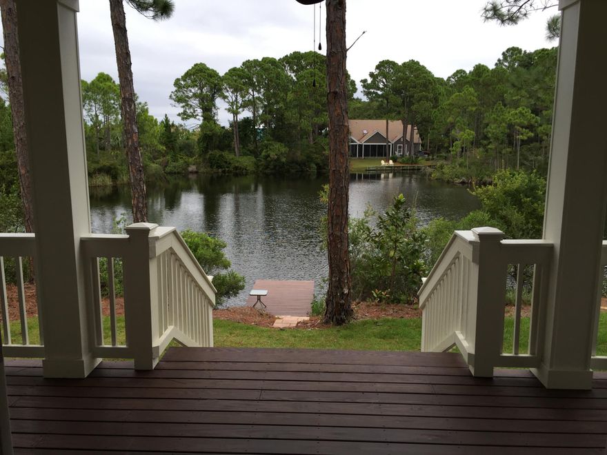 One of a kind Beautiful lake front home with slight views of the bay. Your own piece of paradise in the midst of the Miramar Beach community. Conveniently located minutes from shopping, entertainment and the Beach. This home has impact windows with Low-E glass, raised ceilings, Granit counter tops, a dock, standing seem metal roof, under counter lighting, an oversized master shower with dual shower heads, and much more.