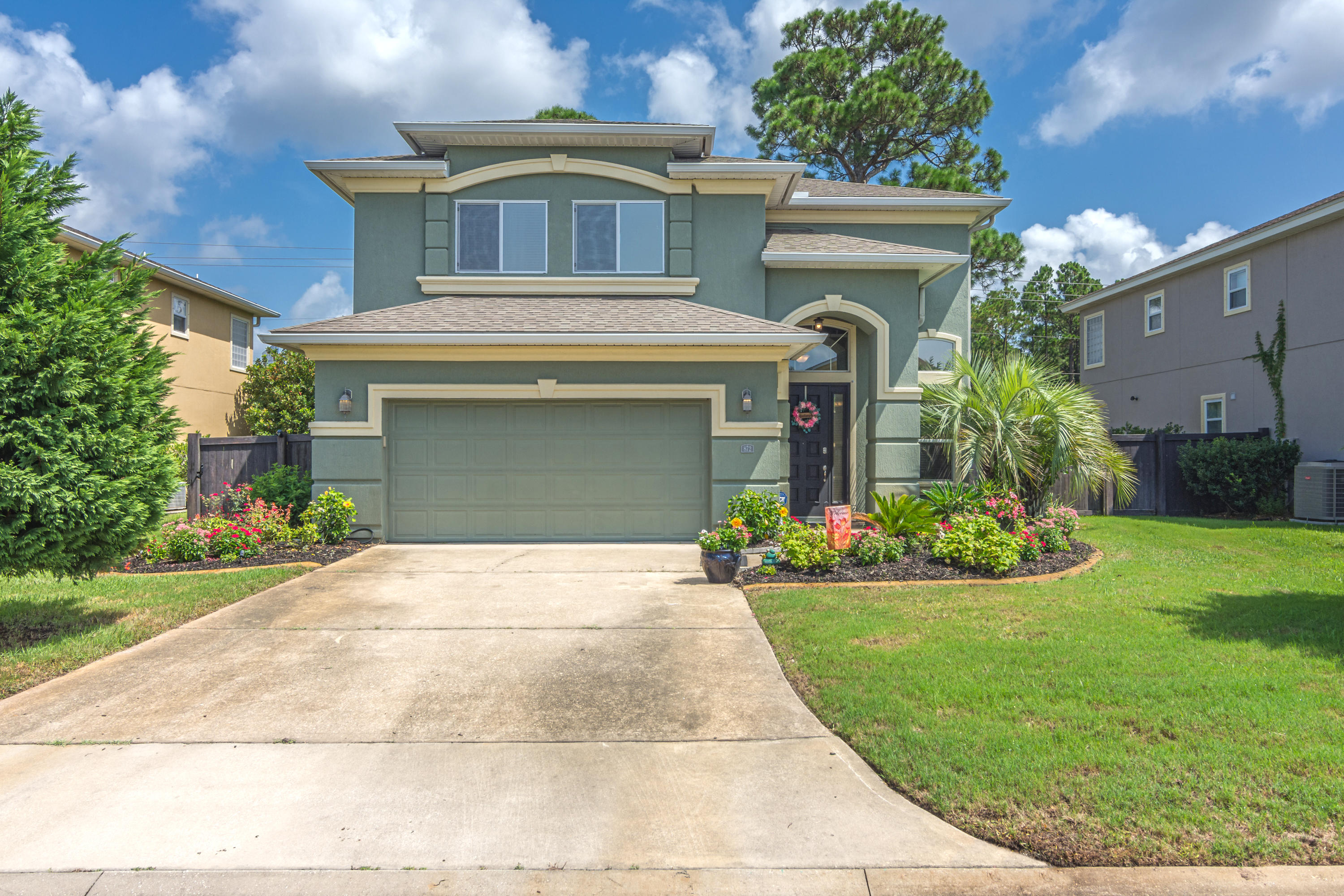 Beautiful open concept home with 24 foot ceilings! Gorgeous kitchen open to living area that is both warm and coastal. The upstairs has a large master suite with huge closet and spacious master bath along with a sitting area. The upstairs has a loft area that is perfect for a home office or homework space for kids! Hurricane shutters and cabinets are located in the garage with upgraded floor. The backyard has a nice patio area with a pergola. Homeowner's Association does your lawn! There is a sprinkler system along with a no rust tank system to keep your home looking beautiful and clean. This home is a great location -- so close to Hurlburt Field and central between Mary Esther city limits and Navarre. All measurements should be verified by buyer
