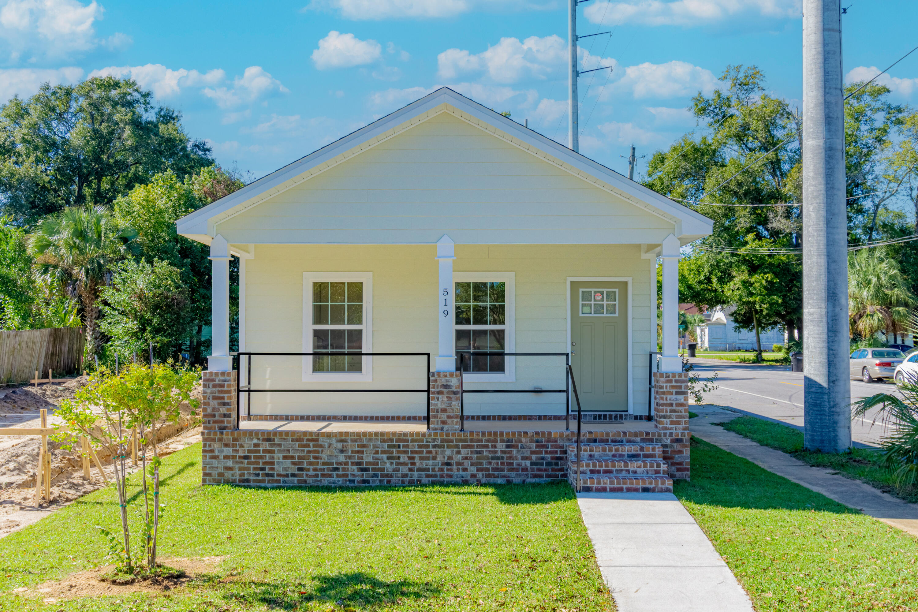 Welcome to your brand new home, located in The West Garden District of Down Town Pensacola. Enjoy the best of Pensacola with easy access to downtown, Blue Wahoo's stadium, YMCA, beaches, shopping, dining and entertainment.  Then come home and relax in your new home with 9' ceilings, open kitchen living room design with entertainment in mind.  Luxury vinyl plank flooring through out the home, granite counter tops in kitchen and baths.  Primary suite offers walk in closet, ceiling fan with its own bathroom.  The second bedroom comes with a ceiling fan as well.  The large laundry room give you plenty of room with extra storage space.  Large front covered porch, brick accent along with hardy board siding.