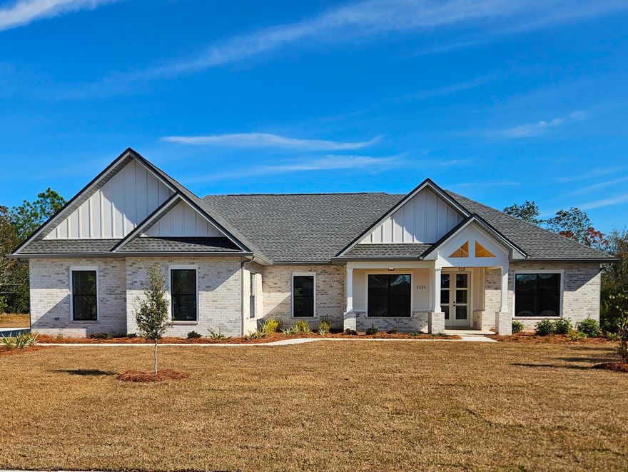 New Construction Custom Built Home on .66-acre lot that backs directly to the golf course, offering unparalleled privacy and serene fairway views with no immediate rear neighbors. The entire property is fully landscaped with a complete irrigation system, creating effortless curb appeal and a lush, low-maintenance yard. Step inside through the dramatic 8' tall double French front doors and be greeted by sophisticated, high-end finishes at every turn. The open-concept design features smooth drywall finishes, no carpet anywhere, and premium 9'' wide-plank LVP WPC flooring throughout - a durable Wood Plastic Composite core that's waterproof, quiet underfoot, and beautifully mimics natural wood. Gourmet Chef's Kitchen Designed for both everyday living and entertaining, the chef-inspired kitchen boasts: 
Custom wood soft-close cabinetry 
Elegant Quartz countertops 
Striking custom vent hood with shiplap ceiling detail
GE Profile stainless appliances
Delta brushed gold hardware and fixtures
Modern black-and-gold lighting and accents

Adjacent is an incredible walk-in pantry with built-in shelving, additional quartz counters, workspace cabinetry, and dedicated space for a beverage fridge - perfect for the home chef or entertainer.

Spa-Like Primary Suite & Bath Retreat to the luxurious primary bedroom featuring a spa-worthy ensuite bath:
Oversized curbless walk-in shower with Delta rain showerhead + handheld
Advanced Schluter waterproofing system for superior leak and mold prevention
Split vanities with quartz tops, ample storage cabinets, and brushed gold Delta faucets
Contemporary black-and-gold fixtures carried throughout

Thoughtful High-End Details Everywhere
Kwikset modern door hardware in black
Delta faucets in brushed gold/bronze throughout
Energy-efficient black double-pane windows
2x6 exterior wall construction for better insulation and strength
6' gutters, Hybrid Water Heater Wi-Fi with energy savings 
360 sq ft storage above garage

Outdoor Living Perfected
Welcoming front porch with tongue-and-groove wood ceiling
Expansive back porch with vaulted ceiling and ceiling fan, ideal for enjoying golf course sunsets
Side-entry 3 car oversized garage - Room for large-size trucks, boats, or workshop space
Extra-large driveway for ample parking

Neighborhood features: Pool, tennis courts, walking trails. 

