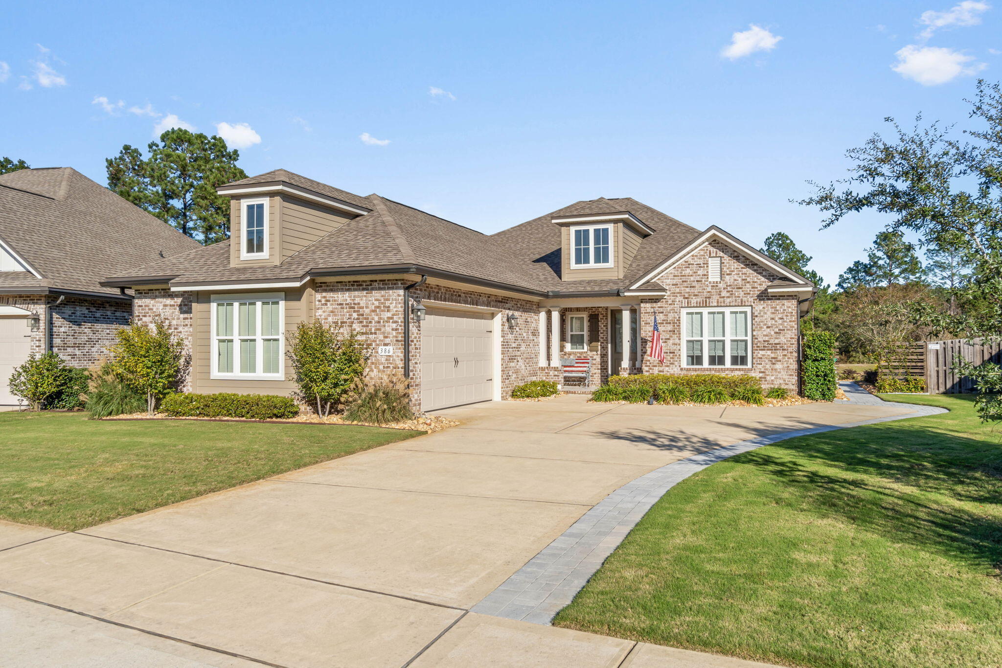 This stunning home is packed with upgrades and modern features, making it the perfect blend of style and functionality. The HVAC system was upgraded in 2022, while the kitchen underwent a complete renovation in 2023, including new appliances and beautiful stained knotty alder cabinets. A Scotsman under-counter nugget ice maker, installed in 2022, adds convenience to your kitchen. The exterior of the house was freshly painted in 2023, and the property boasts a whole-house generator for peace of mind. Enjoy a relaxing outdoor oasis with a pool and screen enclosure added in 2023, complemented by brand-new landscaping scheduled for 2024. Inside, you'll find luxury vinyl plank (LVP) and tile flooring throughout--no carpet. The home features custom window shades and treatments, a spacious 40-inch-wide front entry door, and a cozy fireplace in the living area.

This premium lot offers serene views overlooking two ponds and green space, creating the perfect backdrop for entertaining or unwinding. Additional highlights include upgraded ceilings on the front and back porches, an upgraded concrete finish on all porches, and Hunter ceiling fans throughout the home. Practical features include a heavy-duty attic ladder, custom closet and pantry shelving (no wire shelves), and a whole-house electrical surge protector. With its thoughtful design, modern upgrades, and premium location, this home truly has it all!