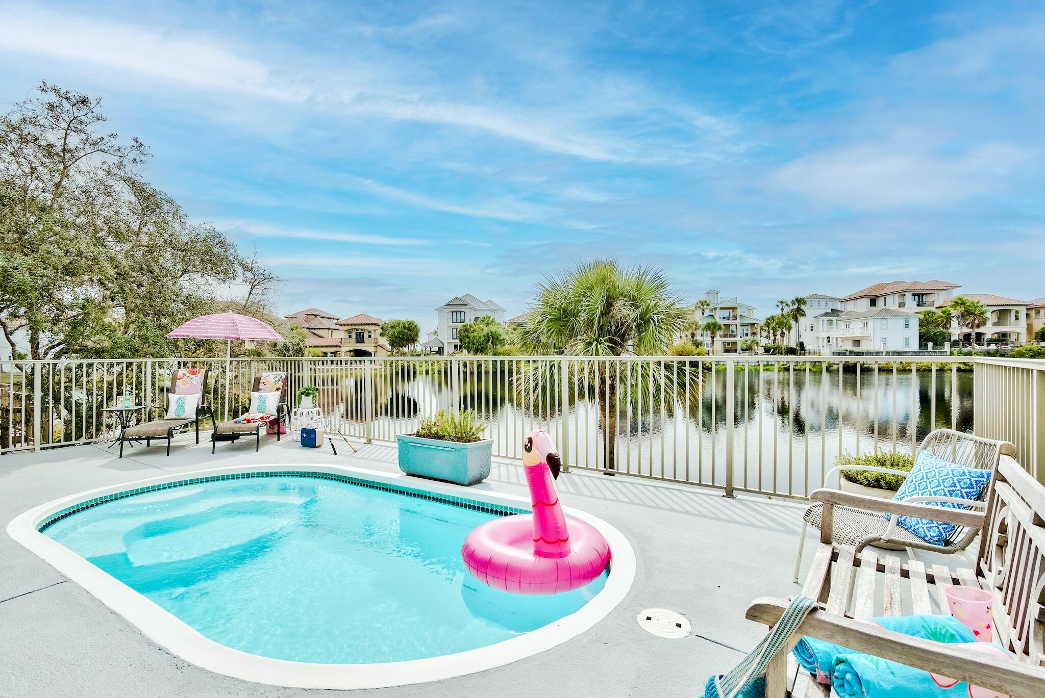 Located within one of the most sought-after Destin communities is this beautiful lakefront home + saltwater splash pool in the gated Destiny neighborhood. Would be an incredible primary or secondary residence, or this home is sure to be a huge rental income producer with 3 full bedrooms, a potential bunk alcove, and widow's watch on the top floor with a daybed, kitchenette, and Gulf views. Large living room with fireplace and built-ins newly remodeled gourmet kitchen with professional grade appliances, sleek stone counters, and new white shaker cabinetry. A grand master suite on the first floor with pool access and water views and a large fully remodeled master bathroom with separate shower, freestanding soaking tub, and walk-in closet. The home has a 2 car garage and driveway allowing ample parking.
Recent upgrades include:
*photography will be updated with new updates soon!
- 2 new HVAC units installed 3/25 for over $12,000 with warranty
- Roof replaced in 2017 with top grade materials
- 2nd floor has all new carpet and stairs are now wood
- Newly renovated kitchen with all new cabinetry, appliances, counters, and lighting
- Updated wood look tile floors throughout the entire main living level
- Newly remodeled master bathroom with beautifully tiled walk-in shower, separate soaking tub and double vanities plus a HUGE walk-in closet
- New full bath addition on main level with walk-in shower featuring beautiful tile