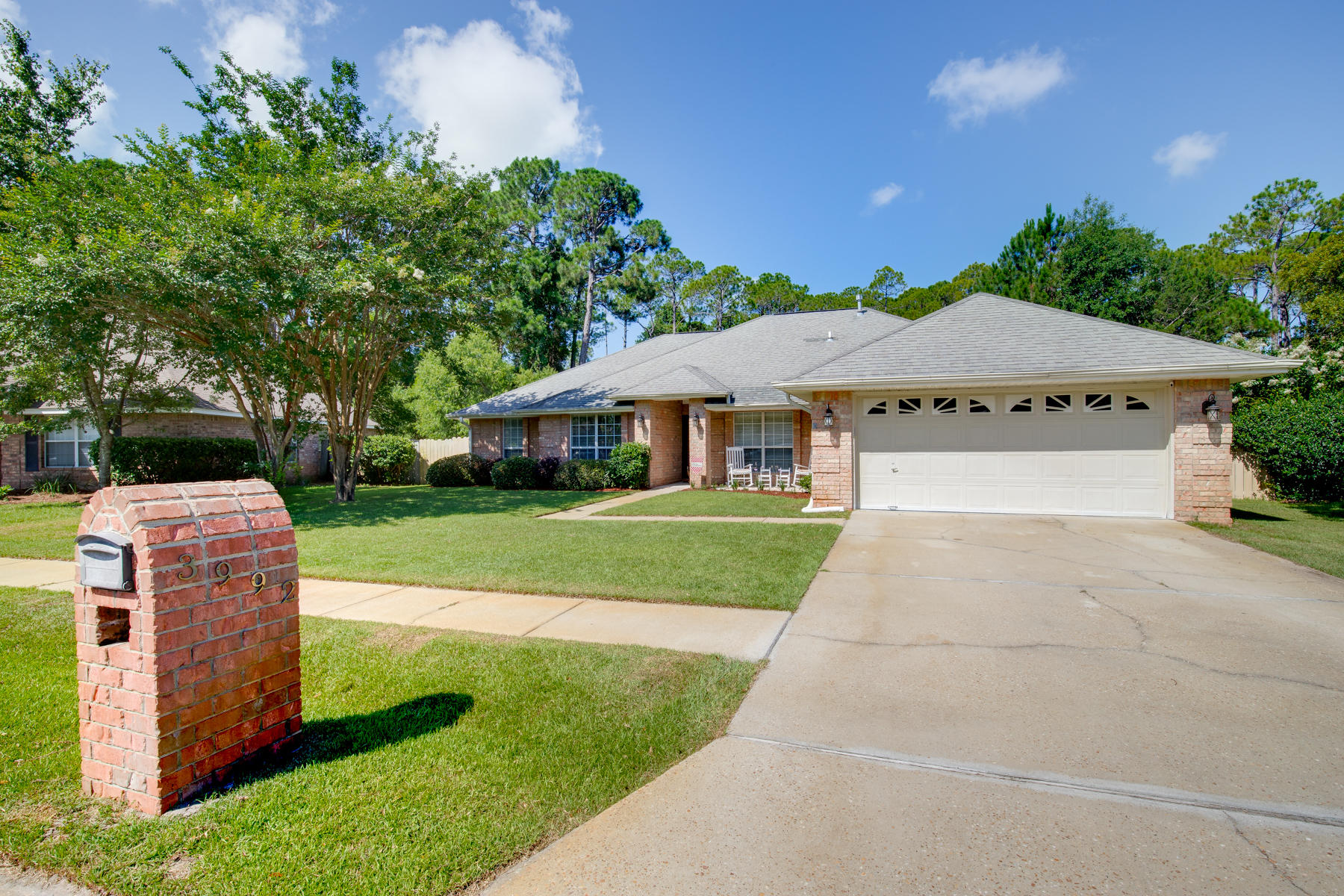 Lots of room. All brick 4 bedroom home with 2 full baths, plus large office and formal dining room. Located in the highly sought after neighborhood of Hidden Pines. The updated kitchen includes granite counters, stainless steel Whirlpool appliances, beautiful cherry wood cabinets, and a gas stove-top double oven with 6 burners. Some of this home's other features include granite counters in both bathrooms, rich hard-wood flooring in the formal dining room, vaulted ceiling in the living room, contemporary paint colors throughout, lots of natural light, fenced-in back yard, sidewalks and underground utilities. Home has natural gas hot water heater/heat unit. This home is centrally located in Destin and qualifies for VA financing.