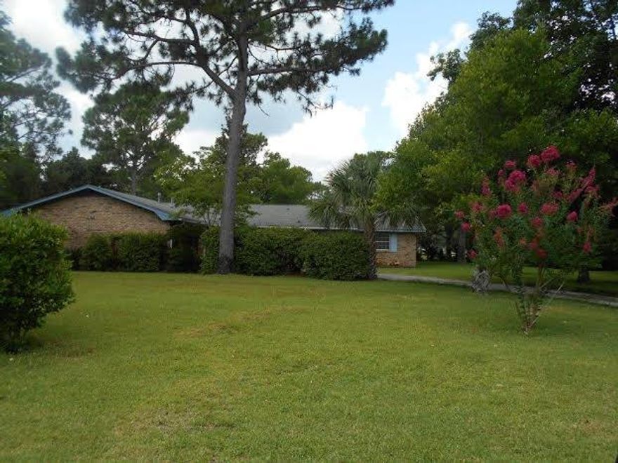 THIS IS A BEAUTIFUL GOLF COURSE HOME. WELL MAINTAINED OVER THE YEARS WITH THIS ONE OWNER HOME The screened- in porch helps you enjoy the GOLF course view. Furniture on porch does not convey. Refrigerator AS IS. Terazzo is probably thru-out the home, but most floor is covered. There are a few dbl. paned windows, but most are single paned. Sky light in family room. A lot of paneling thru out the home. Lotsa closets.