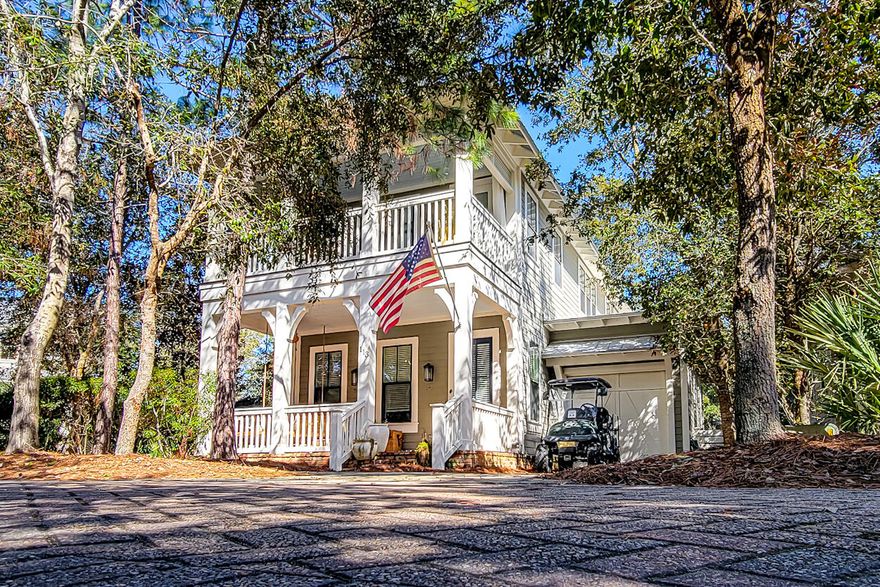 Set on a peaceful, wooded cul-de-sac in Forest Lakes, this Florida Craftsman provides open living with convenience to all of the community amenities for a natural lifestyle. Enjoy a two-tiered pool with waterfalls, an architectural pool house with summer kitchen and fireplace, lakeside trails, playground, basketball hoop, all while backing to the State Forest for nature hikes and just moments from the public beach access. The main level opens to the living, dining and kitchen area and flows to a first-floor bedroom with ensuite bath, laundry room, half-bath and garage. The second floor provides a master suite, with built-in office and two walk-in closets, and an additional bedroom. The kitchen features stainless appliances and quartz counters, and extended bar seating. Floors are finished in hardwood and ceramics. Take in the outdoors from two covered porches and a covered and screened back porch leading out to pavered outdoor lounging area.

All bedroom closets are spacious walk-ins and each bedroom has an ensuite bath.

All measurements and information are deemed reliable but should be verified by the buyer.