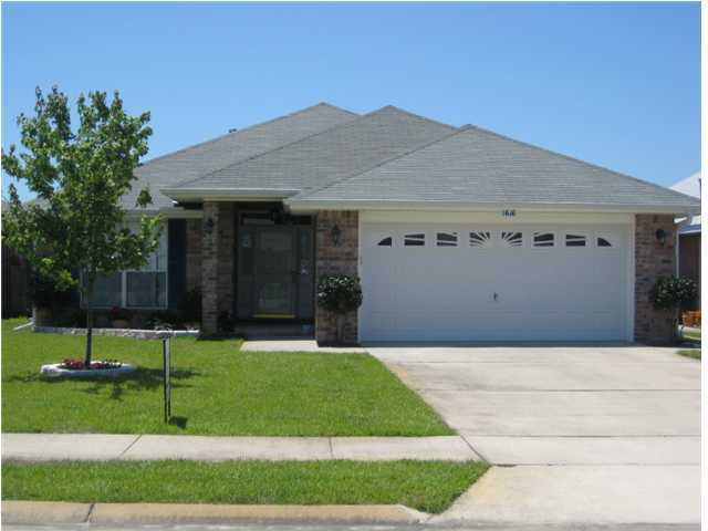 LCATION! LOCATION! LOCATION! One of the best places to live in FWB. EMERALD VILLAGE. It is so close to shops, schools, beaches and bases. You will fall in love with this great famiy home. This delightful and well maintained brick front home is a must see! The large family room has cathedral ceilings and plant shelves and there is a charming chair rail in the dining room. Master bedroom is spacious with a great walk-in closet. The large master bathroom has a dual vanity, walk in shower and linen closet. The kitchen is cheerful with fantastic cabinet and counter space, smooth top stove, breakfast bar and pantry off the breakfast nook. Lawn is complete with beautiful landscaping, lawn pump and sprinkler system. Large two car garage with pull down stairs for attic storage. Pets allowed