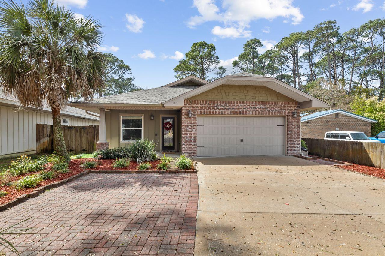 Amazing location to dine, shop, and explore Downtown Fort Walton beach! Like New, Open-concept, split floor plan home with tall ceilings, crown molding, granite countertops, tile flooring throughout, recessed lighting, garage, and a backyard oasis, fully-fenced with a pond, garden, and storage shed. Living area is open concept with a dining area and breakfast bar that overlooks the kitchen. Kitchen has stainless steel appliances, an island, plenty of cabinet space, and granite countertops galore!. Relax in your oversized primary bedroom with sitting area and a spacious primary bathroom with dual vanity, two walk-in closets, separate shower, and jetted tub. Golf-cart friendly neighborhood. Library is 0.3 miles, Publix Shopping Plaza is 0.2 miles, 0.7 miles to water and boat ramp access.