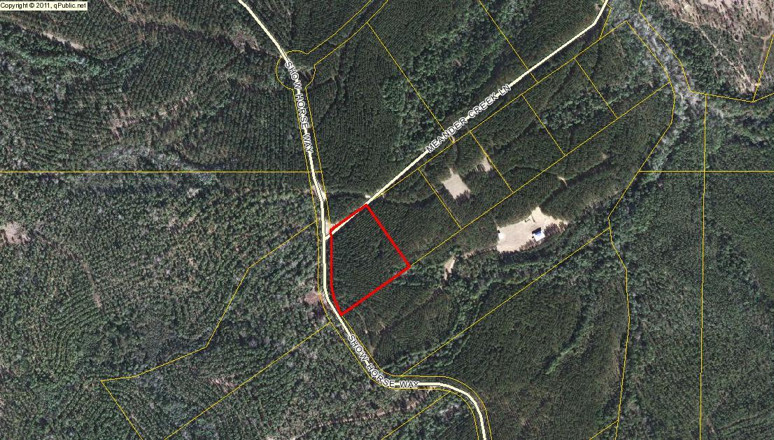 4.3 acres located on the corner of Meander creek lane and show horse lane, Best priced lot on the Plantation.