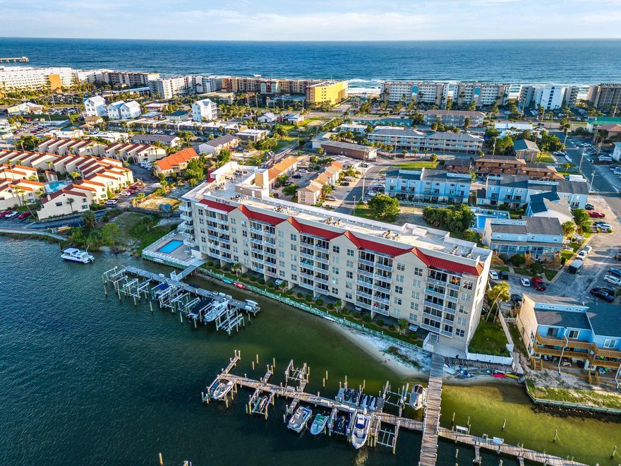 Spend your days watching sunrises and sunsets from this beautifully renovated 1845 sqft, 2 bedroom, 3 full bath condo! From its fourth floor location your views of the Santa Rosa Sound/Intercoastal Waterway and the Emerald waters of the Gulf of Mexico are what make this unit so unique. You will find yourself watching boats all day as they cruise the Intercoastal waterway. You will also have a front row seat to the fireworks shows at the landing. This unit, originally 2 units, was completely renovated to create a wonderful space with over-sized rooms and a beautiful flow of space. The chef in your family will appreciate the gorgeous kitchen with granite countertops, a kitchen island and newer appliances. The master suite offers space like non-other in a 2 bedroom condo.