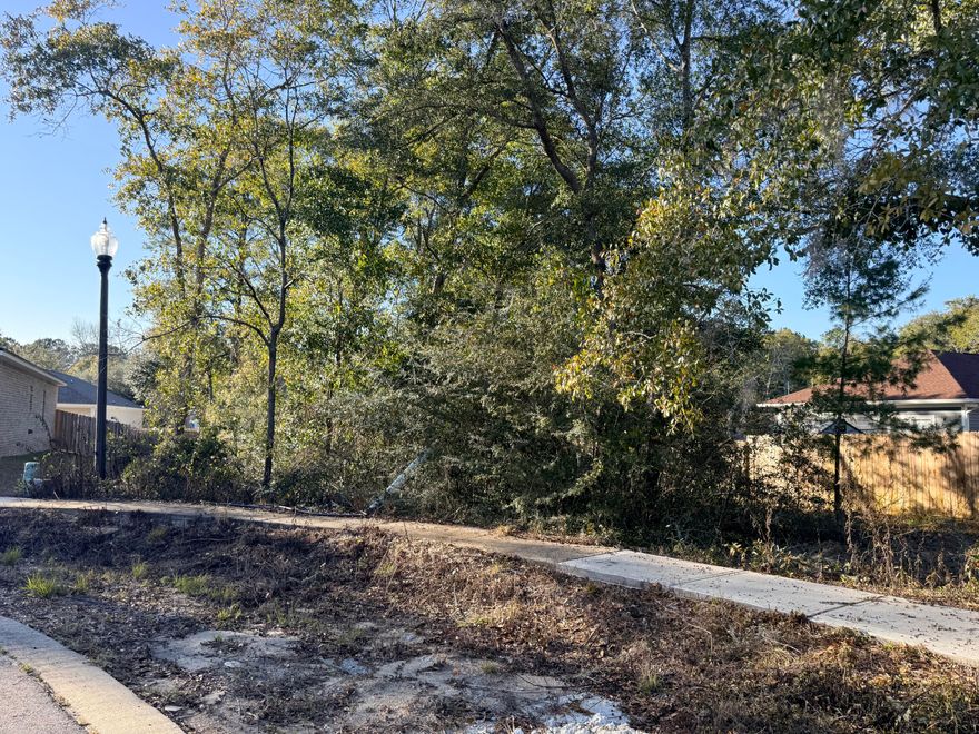 Build Your Dream Home in the Heart of Freeport!This beautifully wooded, ready-to-build lot offers the perfect blend of convenience, and coastal lifestyle. Enjoy nearby fishing on Four Mile Creek, easy access to the Choctawhatchee Bay for boating and cruising, or spend your days soaking up the sun on Florida's famous white-sand beaches.Centrally located between Fort Walton Beach and Panama City Beach, this property puts you within 30-45 minutes of endless recreation, dining, and entertainment--including Destin's world-famous Crab Island. Situated in a peaceful community with low HOA fees and minimal restrictions, the neighborhood allows single-family homes with a minimum 1,000 sq ft requirement.Additional highlights include Flood Zone X, Walton County GIS indicating no wetland, and city water and sewer tap fees already paid, adding immediate value and ease for future construction. A rare opportunity to build in a serene yet well-connected locationdon't miss it!