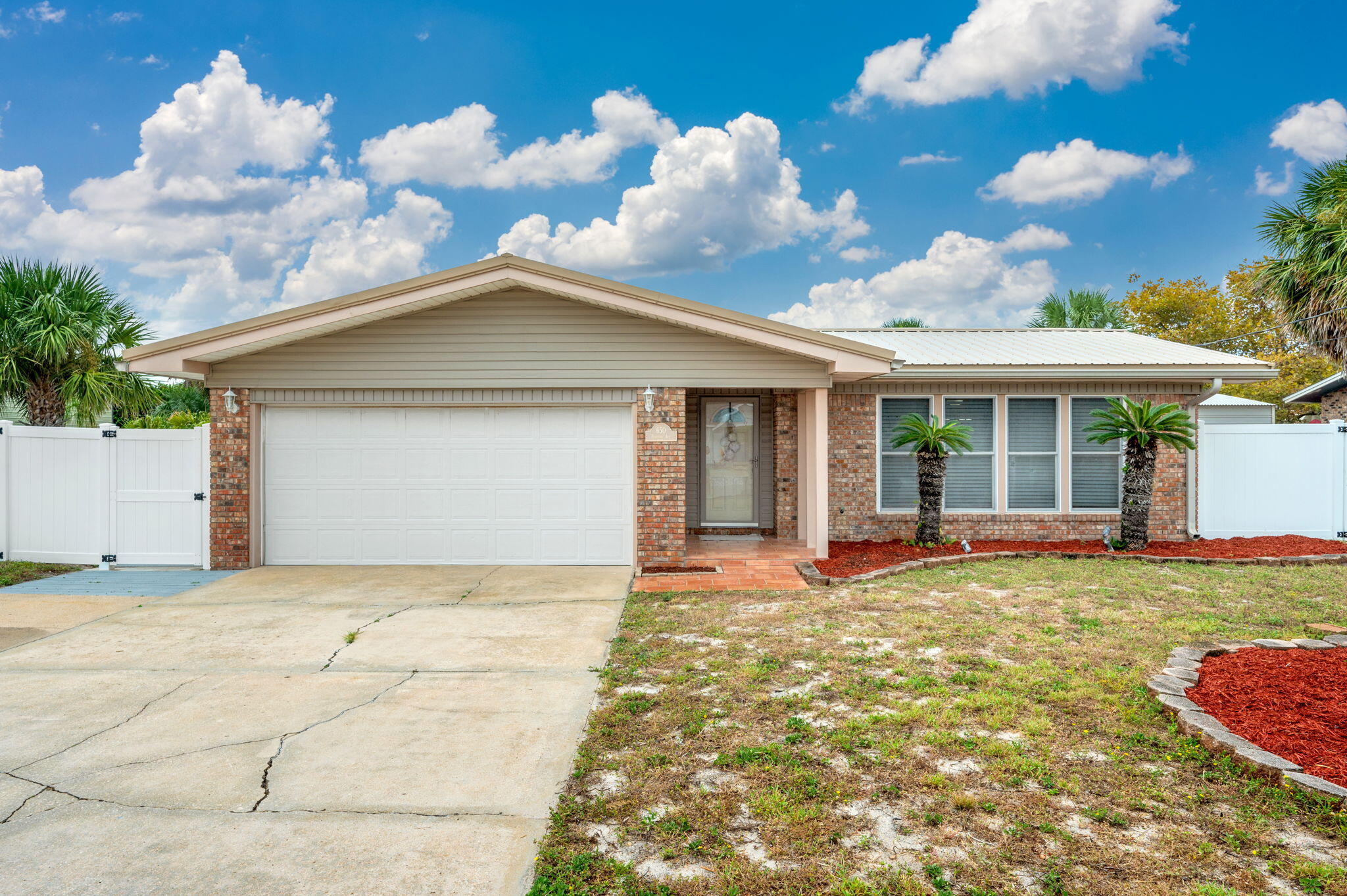 Welcome to your beachside retreat on beautiful Okaloosa Island! This property offers the perfect blend of coastal living and entertainment. The 2024 resurfaced and retiled gunite pool with a 2025 pool pump, hot tub (2023), and pool cabana (2023) create the ultimate backyard oasis. A vinyl privacy fence (2021) and Trek walkway leading from the front yard to the patio complete the outdoor setting.The spacious yard provides plenty of room to enjoy alongside the pool, while additional parking is available for a boat or RV. Inside, the home features tile flooring throughout, a generous living room, a separate family room, and an easy-flow floor plan ideal for both relaxation and gatherings.Other updates include a 2018 roof and the conversion of the Assignment of Lease to a Warranty Deed. This home is Conveniently located to a public beach access, you'll enjoy quick trips to the white sandy beaches of the Emerald Coast. With a large lot, multiple living spaces, and modern updates, this home is filled with potential for island living at its best.