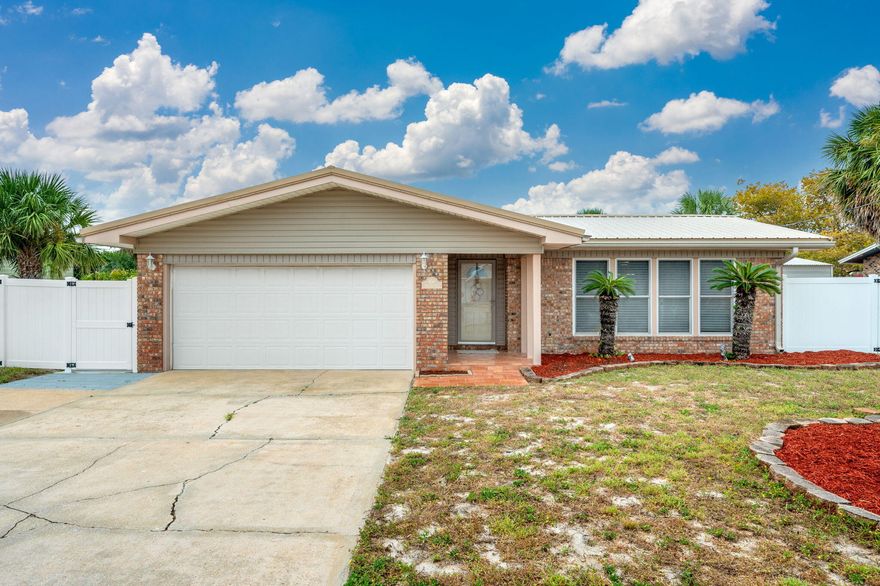 Welcome to your beachside retreat on beautiful Okaloosa Island! This property offers the perfect blend of coastal living and entertainment. The 2024 resurfaced and retiled gunite pool with a 2025 pool pump, hot tub (2023), and pool cabana (2023) create the ultimate backyard oasis. A vinyl privacy fence (2021) and Trek walkway leading from the front yard to the patio complete the outdoor setting.The spacious yard provides plenty of room to enjoy alongside the pool, while additional parking is available for a boat or RV. Inside, the home features tile flooring throughout, a generous living room, a separate family room, and an easy-flow floor plan ideal for both relaxation and gatherings.Other updates include a 2018 roof and the conversion of the Assignment of Lease to a Warranty Deed. This home is Conveniently located to a public beach access, you'll enjoy quick trips to the white sandy beaches of the Emerald Coast. With a large lot, multiple living spaces, and modern updates, this home is filled with potential for island living at its best.