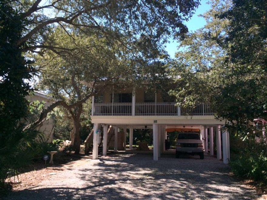 South of 30A & less than 200 yards to the beach! This beach cottage is located just west of Eastern Lake in a gorgeous Old Seagrove-like area with sandy lanes and no home owners fees. Elevated on pilings this single story home offers a spacious living area opening to a large screened front porch, perfect for enjoying the summer gulf breezes. Master bedroom is complete with a large walk-in closet. Never been rented and neat as a pin. Plenty of parking and opportunities for your backyard- Room for a pool on this 108x50 property. Owners closet or storage space deep enough for kayaks, bikes, you name it- located at the top of the side entrance stairs. Time to enjoy a home at the beach where two beach accesses are just 2 minutes away!