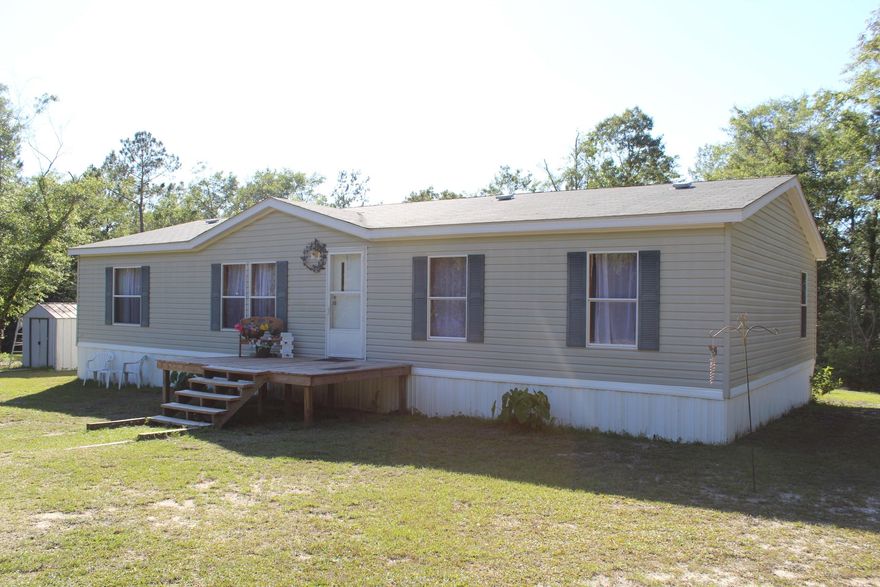 Now this is country living! This 3 bedroom, 2 bathroom home is located on a private 10 acres between DeFuniak Springs and Freeport! Talk about prime location with easy access to the Emerald Coast! The home has an open floor plan with split bedrooms, master bedroom is just off the living room and the two additional bedrooms along with the second full bathroom are located on the opposite ends of the home. The den would make an amazing fourth bedroom, as that is what the current owners are using it for! Home is updated with a new well and HVAC within the last year. Make an appointment for your private tour today!