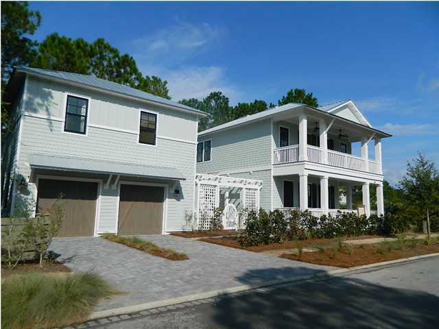 There's something for everyone in this beautiful new WaterColor residence from Weekley Homes with 5 bedrooms, 5.5 bathrooms, a bunk room and a guest retreat over the garage. A covered porch leads to both the entry way and a wraparound open air deck for soaking up the bright Florida sunshine and warm gulf breeze. On the main floor, you'll find spacious open concept family, dining and kitchen areas, a powder room for guests and a bedroom with en suite bathroom. The kitchen is equipped with a fantastic Jenn-Air Pro Style Appliance package, marble countertops and a marbled backsplash. Additional home features include whitewashed hardwood flooring throughout, marble bathroom countertops, tile and stone bathroom flooring with glass tile wall accents.