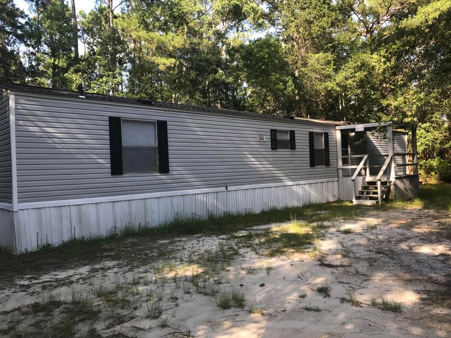 Great investment for Freeport area. Home is move in ready! Cash offers please as this home was moved into place 15 years ago from another location. New roof installed last year so structure is insurable. You won't find another property for this discounted price in all of Freeport. Less than a mile from new Publix.