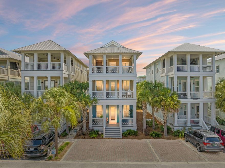 Tucked just one row off Scenic 30A, this Seacrest Beach home offers a well-designed layout across three levels and is steps from the community's lagoon pool and Peddler's Pavilion. With 4 bedrooms and 3.5 baths, the home features fresh updates including paint, light fixtures, decor, and select furnishings. Highlights include a central kitchen with dual breakfast bars, spacious primary suite with private balcony, and a top-level covered porch with summer kitchen. Three dedicated parking spots and strong rental potential add extra appeal. The main level offers a functional flow with the kitchen at the heart of the home, flanked by dual breakfast bars and open to the living and dining areas. A covered front porch, fireplace, pellet ice maker, and convenient power bath round out the first SEE floor. Upstairs you'll find a guest bedroom with en suite bath, a hallway laundry area, and a spacious primary suite with sitting area, private balcony, large bath, and separate garden tub.

The third floor includes two bedrooms, a shared full bath, and a generous covered balcony complete with a summer kitchengrill, fridge, and mounted TV includedperfect for outdoor entertaining.

With three dedicated parking spots & tram pickup out front, the home also enjoys easy access to the 12,000 sq ft lagoon pool and the shops and dining at Peddler's Pavilion. Seacrest Beach offers private beach access, walking trails, and tram service, and sits conveniently between the iconic communities of Rosemary Beach and Alys Beach. Buyer to verify all information.