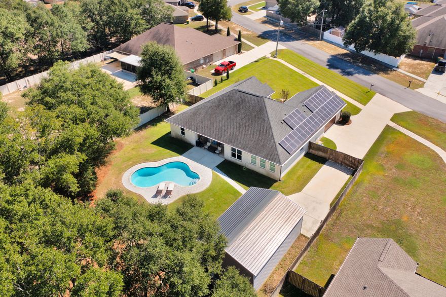 SALT WATER POOL!! This lovely home features an oversized driveway with RV parking. Step inside to see a spacious open floor plan featuring a large sunny living area, trey ceilings & recessed lighting. This kitchen is certainly made for entertaining with luxurious features like the breakfast bar, farmhouse sink, island, granite countertops, and pot filler over the stove. The master bath holds a jetted bathtub, frameless glass walk-in shower and granite counter tops on the double vanity. On the other side of the home there are three great sized additional bedrooms and bathroom. Step outside into your own private oasis & into the sparkling, luminous, crystal-clear saltwater pool.  Make your appointment today, won't last long!