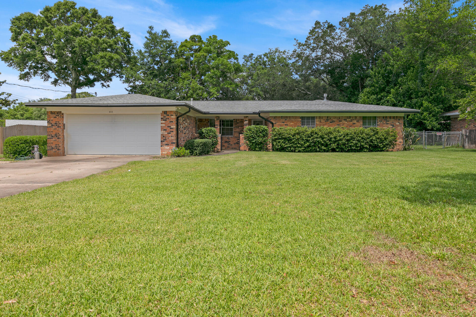 This well maintained, one owner home located in the desirable Kenwood neighborhood is ready for someone to put their special touches on it! Plenty of area to spread out with 4 bedrooms, 2 baths, kitchen, living room, dining room, and two big bonus rooms. It features a large fenced back yard with plenty of room for a pool, shed for extra storage, and large garage!