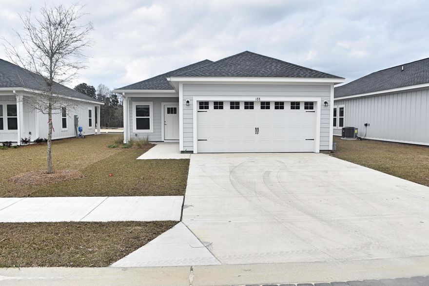 This stunning nearly new  home offers an incredible opportunity to lease a beautiful residence in a prime location. This home features a spacious two-car garage and approximately 1486 square feet of living space, providing both functionality and comfort. The open floor plan creates a seamless flow throughout the main living areas. Step inside and be greeted by the exquisite interior features that adorn this home. The kitchen showcases quartz countertops, white shaker cabinets, luxury vinyl plank flooring, and stainless steel appliances, creating a sleek and stylish space for culinary enthusiasts. The high-quality finishes throughout the home are sure to impress.As you explore the exterior, you'll discover the exceptional features that make this property truly special.