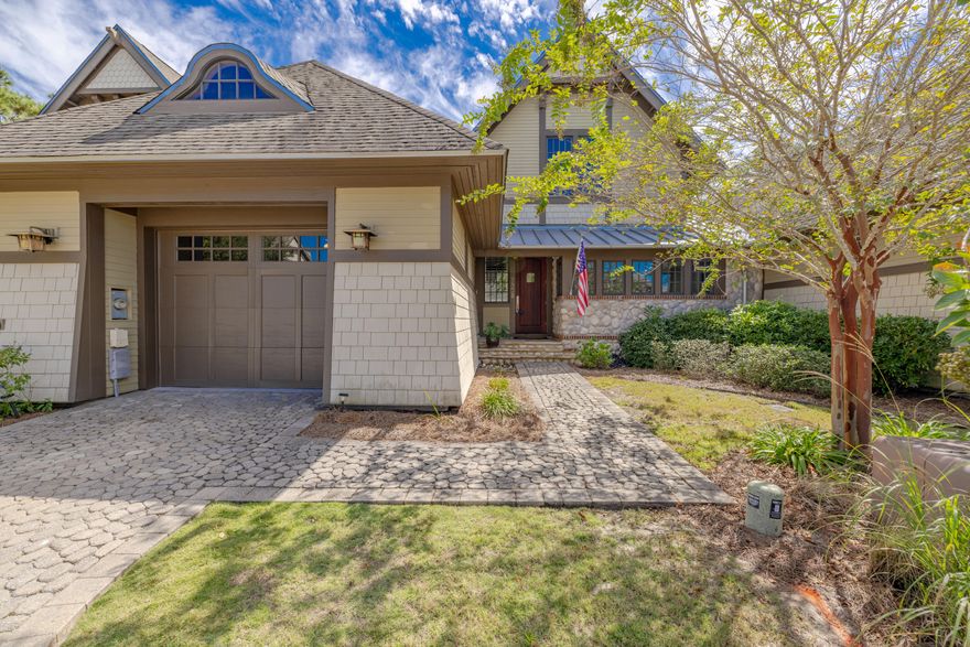 Open House, Sunday, May 18th from 11a-2pm. Luxury Living at its finest in this immaculate condo, that feels more like a home, but has all the benefits of a condo. If you are tired of yard work and maintaining the exterior of your home, this is the home for you.  The community dues at The Courts will cover all your yardwork, maintenance on the outside of the home, pest control, trash disposal, and even insurance on the exterior.  There is so much to say about this home but you truly need to view the pictures and walk-through video to see all it has to offer.  From the time you walk through the front door you feel the amount of space this open concept home has.  From the spacious custom kitchen to include upgraded appliances such as a GE Monogram stove/vent, built-in Thermador refrigerator, to granite countertops, wine refrigerator, solid hardwood cabinetry, and all stainless-steel appliances. The kitchen overlooks the dining room and living room, which has plenty of natural light, custom beamed ceilings, a gas fireplace, expansive windows with plantation shutters, that when opened give you the most beautiful view of the private oasis of conservation land. The first-floor master bedroom has its own private bath with a beautifully tiled garden tub, separate shower, water closet, double vanity sinks, makeup counter, and a large walk-in closet with built-ins. The first floor also has a laundry area and a half-bath. One of the best features of this home is its real hardwood flooring throughout, with the exception of the 3-full baths which are tile. The second story is outlined with windows along the right side allowing for beautiful natural light and features, 2 full bedrooms, which both have their own attached full bath, and a wonderful loft area which is currently used as an office/den. If you enjoy being one with nature, the covered porch is where you will spend most of your time. Sit back, grab a book, and if you like silence, you have found it!!!!! This floor plan is 1 of only 3 built in this community, and this is the side of the street you want to be on for privacy. You face a wooded conservation area for total privacy. Additional features include: 2 new HVACs just replaced and still under warranty, interior newly painted, wood floors recently refinished, nest thermostat, ring doorbell, crown molding, chair railing, wainscotting, alarm system, attic storage, plantation shutters and blinds stay, washer and dryer will convey, 8-ft solid core doors, and updated lighting. If you are not familiar with Wild Heron, it is the premier community in Panama City Beach, noted as a 750-acre, low density, coastal sanctuary, offering a lakeside heated community pool, hot tub, fitness center, boathouse with kayaks and paddle boards for owner use, community dock, fire pit, and miles of walking paths through the community. At The Courts at Wild Heron vacation rentals are not allowed, but you can rent long term, 6+ months at a time. Wild Heron is truly a gated community with 24-hour guards/security. Golf and tennis are available with the Watersound Club membership where Shark's Tooth Golf Course provides an idyllic golf experience all year long. Tucked among the oaks and pines of a coastal sanctuary along the shores of the largest dune lake in Florida, Lake Powell. Shark's Tooth benefits from mature trees, pristine greens, and deep bunkers. Also available to Watersound Club Members and their guests, the Greg Norman-designed course's 18-holes features a mix of pine forest and lake views, and the new The Third Golf Course, estimated to open November 2024. The clubhouse has a pro shop, which will allow you an opportunity to buy everything you need for a beautiful day of golfing! Do you like to fish? Grab your fishing pole and hang out on the dock catching dinner or enjoy one of the weekly food trucks and hanging out with your neighbors. If you like to socialize, this is the neighborhood for you. There are on-going events to

include concerts, community get togethers, holiday events, parades, and so much more. If you enjoy doing water aerobics or yoga, this is the place to be. There is so much to do at Wild Heron, yet its so peaceful that just taking a walk through the community will put you at peace with nature. If this Coastal Craftsman Designed home by renowned Dungan Nequette Architects sounds like the property you have been waiting for, contact your realtor for a private showing before your dream of owning a piece of paradise becomes someone else's reality. Age, sq.ft., room dimensions, schools, taxes, are an estimate and must be verified by the buyer if important.